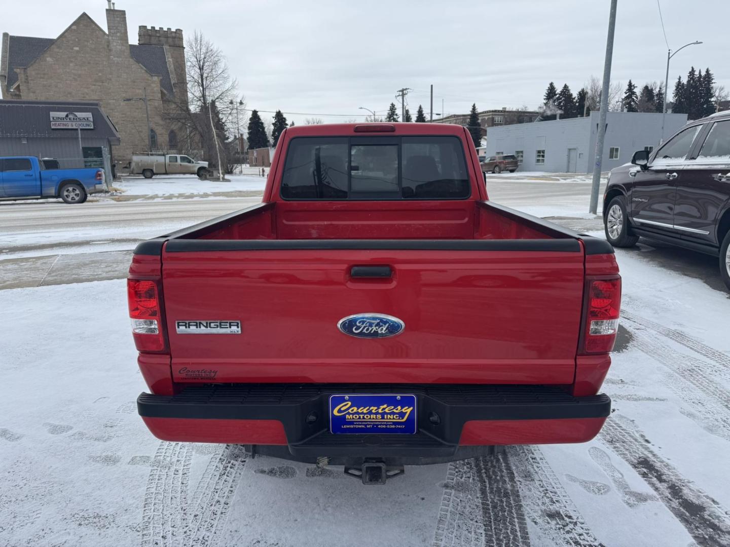 2009 Red /Grey Ford Ranger FX4 Off-Road SuperCab 4 Door (1FTZR45E19P) with an 4.0L V6 SOHC 12V engine, Automatic transmission, located at 116 5th Avenue South, Lewistown, MT, 59457, 47.063877, -109.427879 - Local trade, super clean Ranger 4X4 - Photo#3