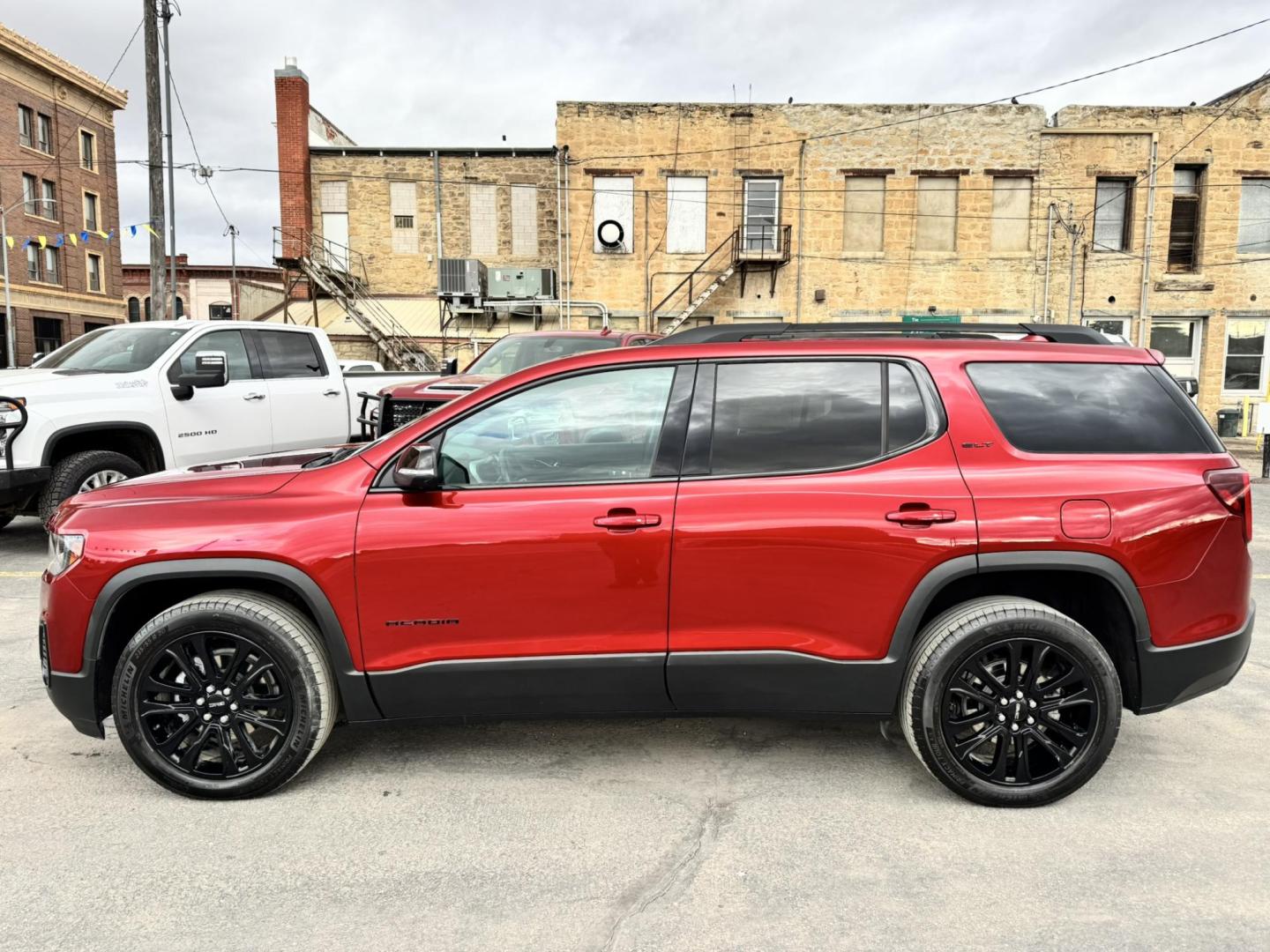 2023 Maroon /Black GMC Acadia SLT AWD (1GKKNULS7PZ) with an 3.6L V6 DOHC 24V engine, 9A transmission, located at 116 5th Avenue South, Lewistown, MT, 59457, 47.063877, -109.427879 - 2023 GMC Acadia SLT AWD Elevation Edition – sharp, loaded, and ready for anything. Finished with the Elevation Edition, this Acadia stands out with blacked-out wheels, trim, and badging that give it a bold, aggressive look you don’t see on every SUV. Powered by a smooth and capable V6 with all- - Photo#5