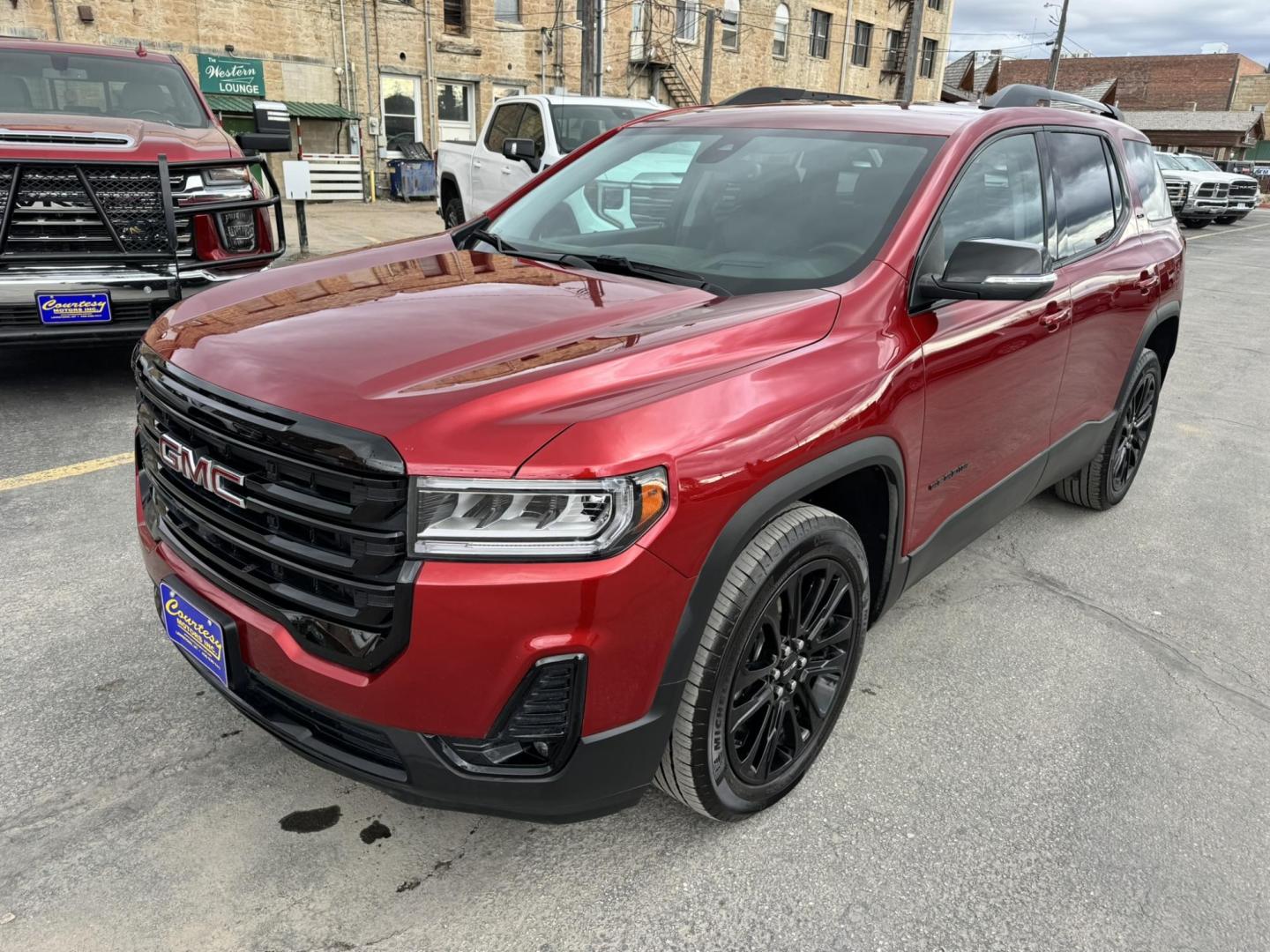 2023 Maroon /Black GMC Acadia SLT AWD (1GKKNULS7PZ) with an 3.6L V6 DOHC 24V engine, 9A transmission, located at 116 5th Avenue South, Lewistown, MT, 59457, 47.063877, -109.427879 - 2023 GMC Acadia SLT AWD Elevation Edition – sharp, loaded, and ready for anything. Finished with the Elevation Edition, this Acadia stands out with blacked-out wheels, trim, and badging that give it a bold, aggressive look you don’t see on every SUV. Powered by a smooth and capable V6 with all- - Photo#6