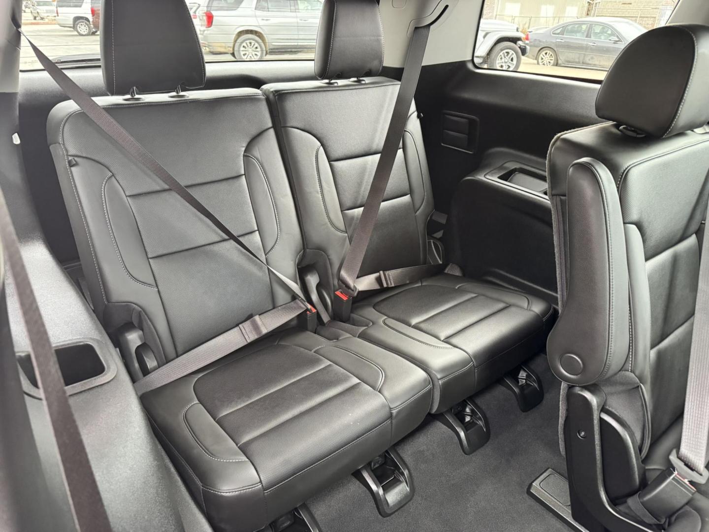 2023 Maroon /Black GMC Acadia SLT AWD (1GKKNULS7PZ) with an 3.6L V6 DOHC 24V engine, 9A transmission, located at 116 5th Avenue South, Lewistown, MT, 59457, 47.063877, -109.427879 - 2023 GMC Acadia SLT AWD Elevation Edition – sharp, loaded, and ready for anything. Finished with the Elevation Edition, this Acadia stands out with blacked-out wheels, trim, and badging that give it a bold, aggressive look you don’t see on every SUV. Powered by a smooth and capable V6 with all- - Photo#9