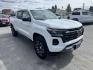 2024 WHITE /Black Chevrolet Colorado Z71 Crew Cab 4WD (1GCPTDEKXR1) with an 2.7L L4 DOHC 16V TURBO engine, 6A transmission, located at 116 5th Avenue South, Lewistown, MT, 59457, 47.063877, -109.427879 - Tough, refined, and built to handle whatever you throw at it—this 2024 Chevrolet Colorado Z71 4WD is the perfect blend of off-road capability and everyday comfort. Powered by a strong turbocharged engine with impressive torque, it delivers confident acceleration, smooth towing capability, and the - Photo#0