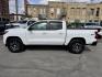 2024 WHITE /Black Chevrolet Colorado Z71 Crew Cab 4WD (1GCPTDEKXR1) with an 2.7L L4 DOHC 16V TURBO engine, 6A transmission, located at 116 5th Avenue South, Lewistown, MT, 59457, 47.063877, -109.427879 - Tough, refined, and built to handle whatever you throw at it—this 2024 Chevrolet Colorado Z71 4WD is the perfect blend of off-road capability and everyday comfort. Powered by a strong turbocharged engine with impressive torque, it delivers confident acceleration, smooth towing capability, and the - Photo#6