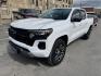 2024 WHITE /Black Chevrolet Colorado Z71 Crew Cab 4WD (1GCPTDEKXR1) with an 2.7L L4 DOHC 16V TURBO engine, 6A transmission, located at 116 5th Avenue South, Lewistown, MT, 59457, 47.063877, -109.427879 - Tough, refined, and built to handle whatever you throw at it—this 2024 Chevrolet Colorado Z71 4WD is the perfect blend of off-road capability and everyday comfort. Powered by a strong turbocharged engine with impressive torque, it delivers confident acceleration, smooth towing capability, and the - Photo#7