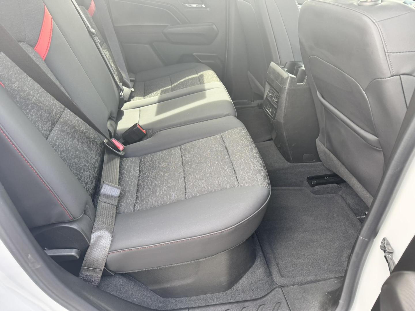 2024 WHITE /Black Chevrolet Colorado Z71 Crew Cab 4WD (1GCPTDEKXR1) with an 2.7L L4 DOHC 16V TURBO engine, 6A transmission, located at 116 5th Avenue South, Lewistown, MT, 59457, 47.063877, -109.427879 - Tough, refined, and built to handle whatever you throw at it—this 2024 Chevrolet Colorado Z71 4WD is the perfect blend of off-road capability and everyday comfort. Powered by a strong turbocharged engine with impressive torque, it delivers confident acceleration, smooth towing capability, and the - Photo#9