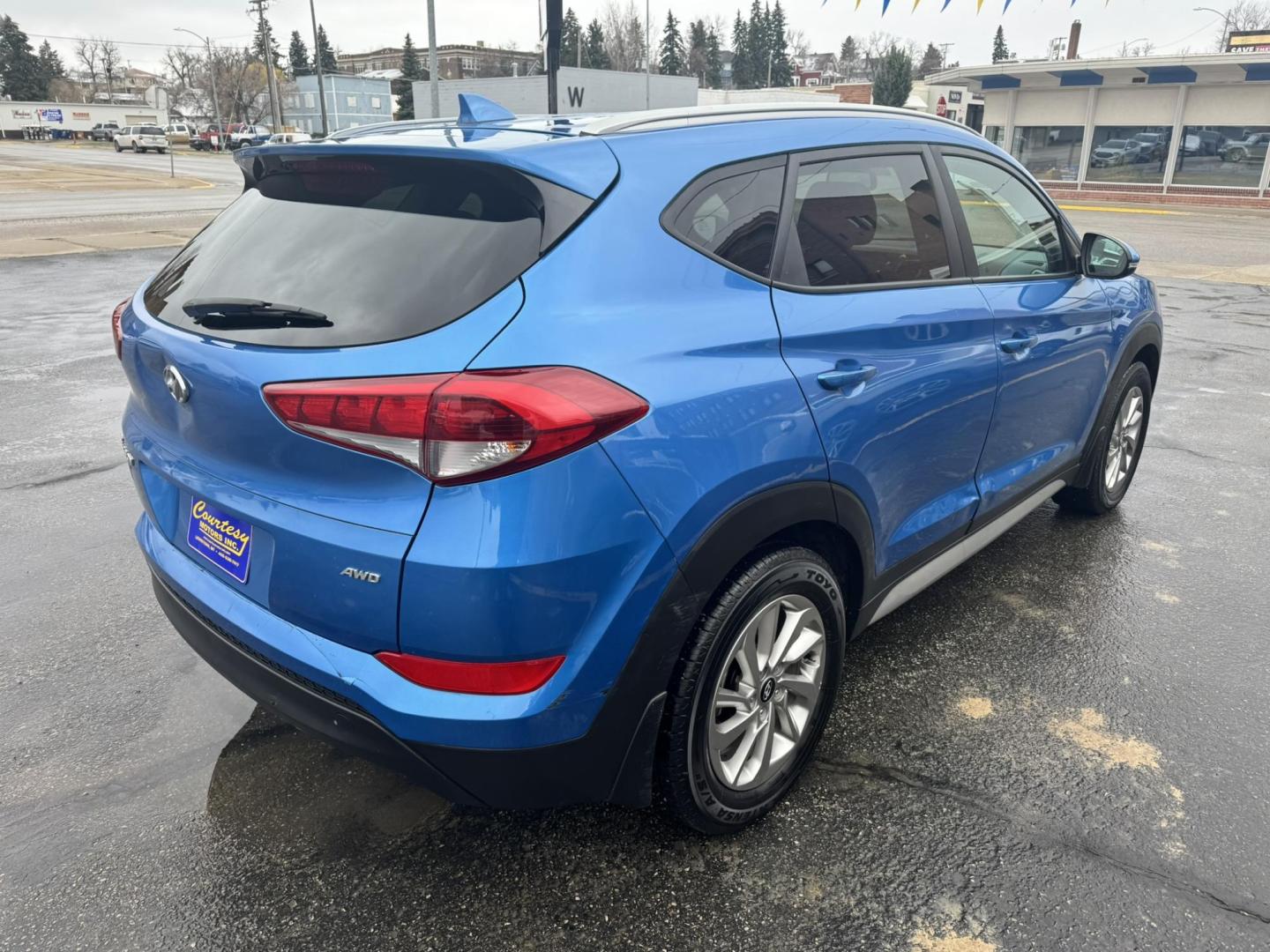 2017 Blue /Black Hyundai Tucson SE w/Preferred Package AWD (KM8J3CA43HU) with an 2.0L L4 DOHC 16V engine, 6A transmission, located at 116 5th Avenue South, Lewistown, MT, 59457, 47.063877, -109.427879 - Photo#2