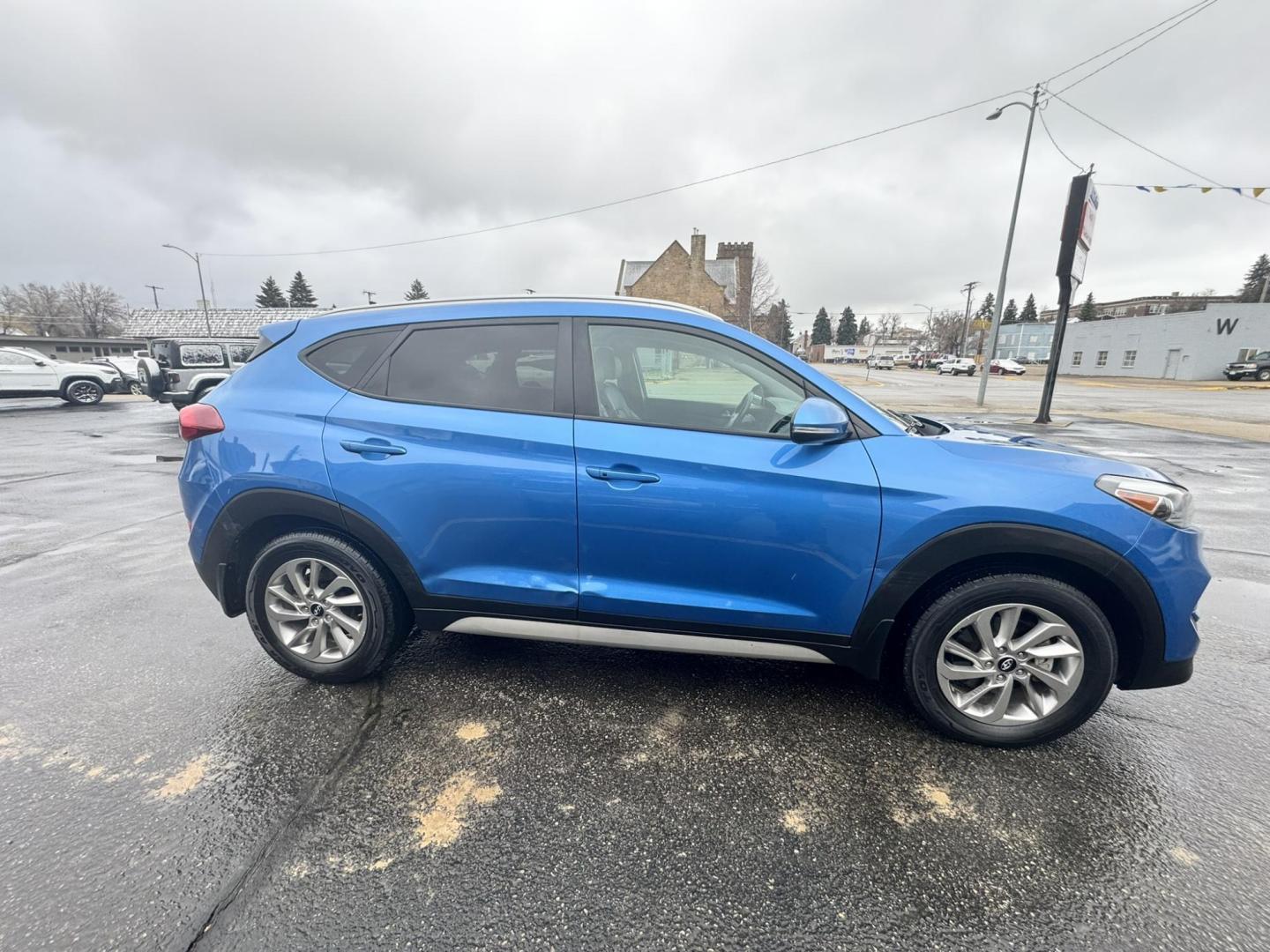 2017 Blue /Black Hyundai Tucson SE w/Preferred Package AWD (KM8J3CA43HU) with an 2.0L L4 DOHC 16V engine, 6A transmission, located at 116 5th Avenue South, Lewistown, MT, 59457, 47.063877, -109.427879 - Photo#1