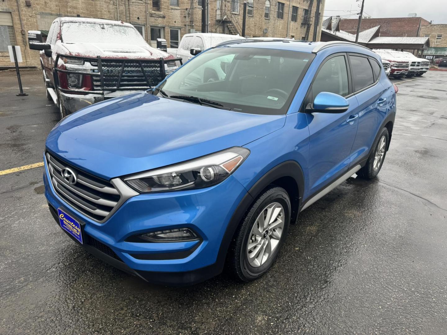 2017 Blue /Black Hyundai Tucson SE w/Preferred Package AWD (KM8J3CA43HU) with an 2.0L L4 DOHC 16V engine, 6A transmission, located at 116 5th Avenue South, Lewistown, MT, 59457, 47.063877, -109.427879 - Photo#6