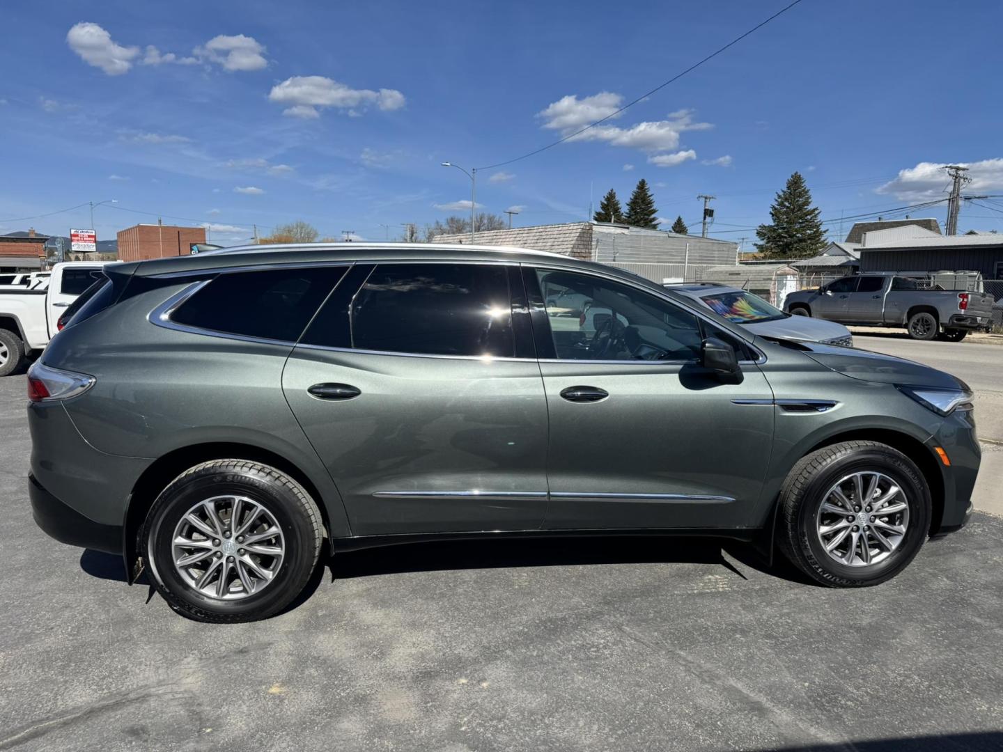 2022 Green /Grey Buick Enclave Essence AWD (5GAEVAKW1NJ) with an 3.6L V6 DOHC 24V engine, 9A transmission, located at 116 5th Avenue South, Lewistown, MT, 59457, 47.063877, -109.427879 - Experience smooth, refined driving in this 2022 Buick Enclave Essence AWD. Powered by a proven 3.6L V6 engine, this SUV delivers strong performance with the confidence of all-wheel drive, making it a great fit for Montana roads year-round. Inside, the Enclave shines with a quiet, upscale cabin feat - Photo#1