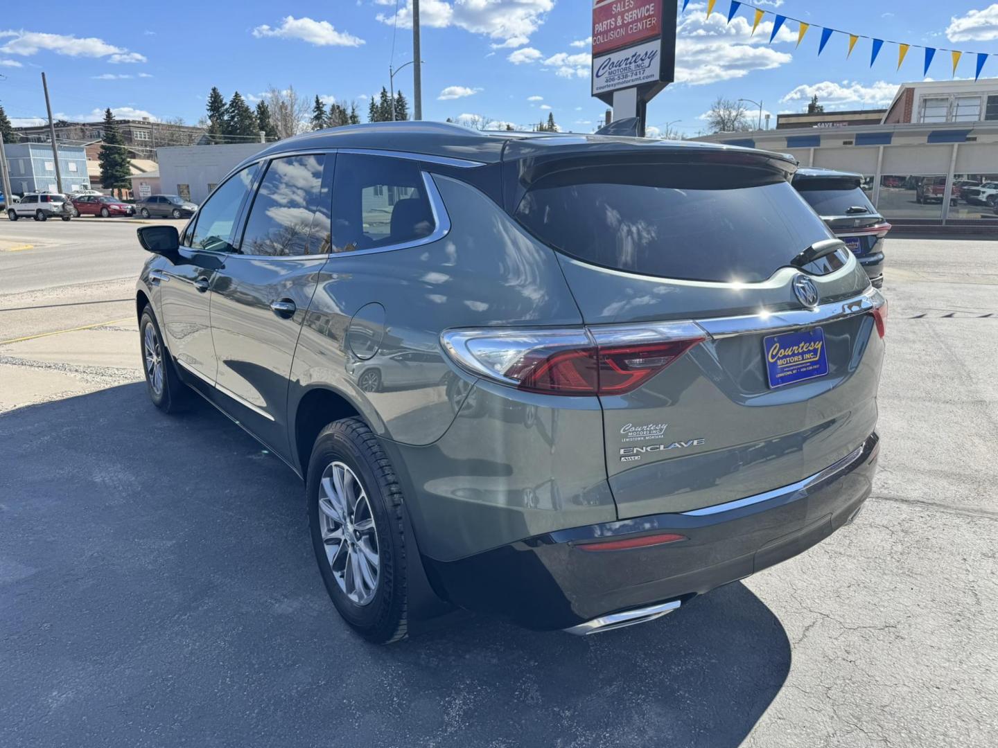 2022 Green /Grey Buick Enclave Essence AWD (5GAEVAKW1NJ) with an 3.6L V6 DOHC 24V engine, 9A transmission, located at 116 5th Avenue South, Lewistown, MT, 59457, 47.063877, -109.427879 - Experience smooth, refined driving in this 2022 Buick Enclave Essence AWD. Powered by a proven 3.6L V6 engine, this SUV delivers strong performance with the confidence of all-wheel drive, making it a great fit for Montana roads year-round. Inside, the Enclave shines with a quiet, upscale cabin feat - Photo#4