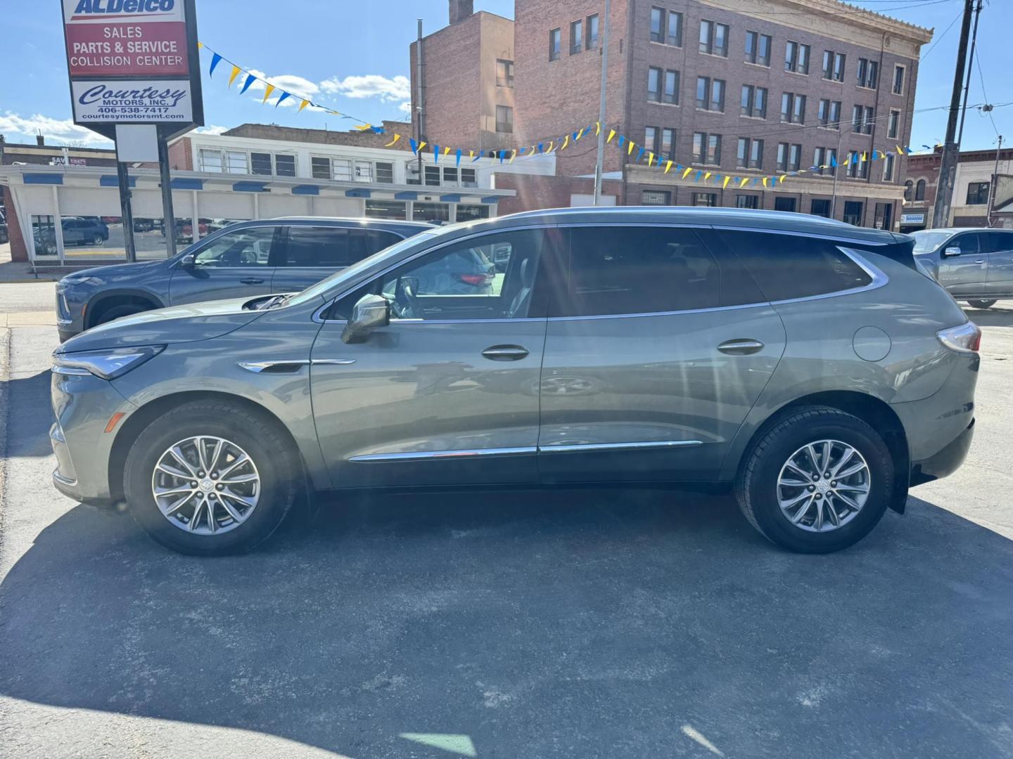 2022 Green /Grey Buick Enclave Essence AWD (5GAEVAKW1NJ) with an 3.6L V6 DOHC 24V engine, 9A transmission, located at 116 5th Avenue South, Lewistown, MT, 59457, 47.063877, -109.427879 - Experience smooth, refined driving in this 2022 Buick Enclave Essence AWD. Powered by a proven 3.6L V6 engine, this SUV delivers strong performance with the confidence of all-wheel drive, making it a great fit for Montana roads year-round. Inside, the Enclave shines with a quiet, upscale cabin feat - Photo#5