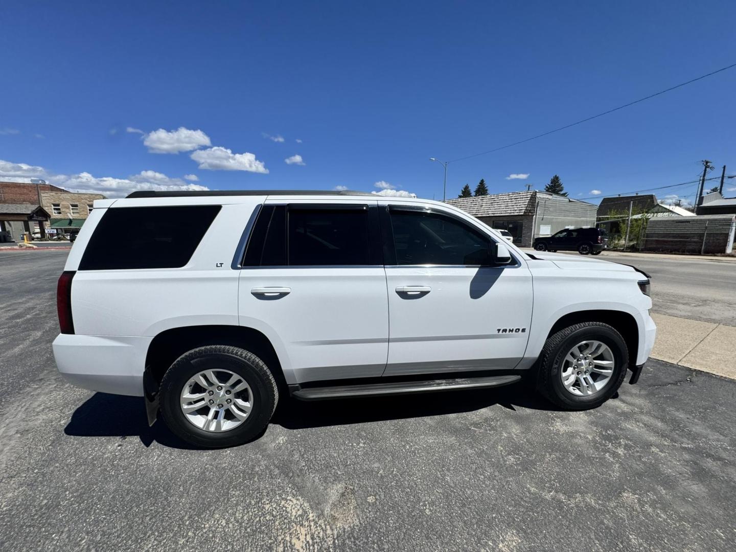 2015 WHITE /Black Chevrolet Tahoe LT 4WD (1GNSKBKC3FR) with an 5.3L V8 OHV 16V engine, 6-Speed Automatic transmission, located at 116 5th Avenue South, Lewistown, MT, 59457, 47.063877, -109.427879 - Two Owner local trade Tahoe!- Photo#1
