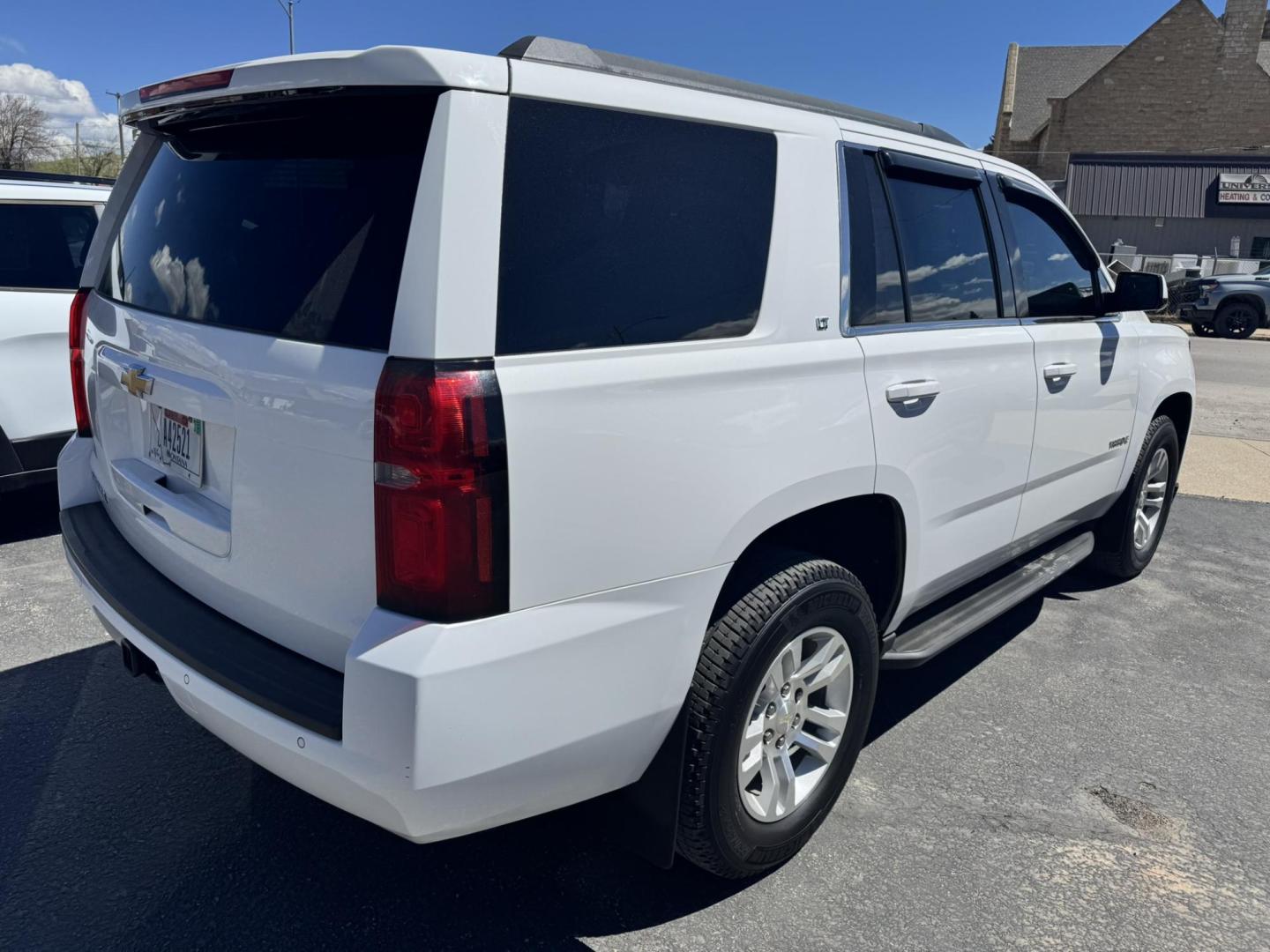 2015 WHITE /Black Chevrolet Tahoe LT 4WD (1GNSKBKC3FR) with an 5.3L V8 OHV 16V engine, 6-Speed Automatic transmission, located at 116 5th Avenue South, Lewistown, MT, 59457, 47.063877, -109.427879 - Two Owner local trade Tahoe!- Photo#2