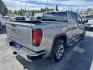 2023 Grey /Tan GMC Sierra 1500 SLT Crew Cab 4WD (1GTUUDEL4PZ) with an 6.2L V8 OHV 16V engine, 6A transmission, located at 116 5th Avenue South, Lewistown, MT, 59457, 47.063877, -109.427879 - Power, luxury, and capability come together in this 2023 GMC Sierra 1500 SLT Crew Cab 4WD. Under the hood is the legendary 6.2L V8, delivering an impressive 420 horsepower and paired with a smooth 10-speed automatic transmission for confident towing, hauling, and everyday driving. The spacious Crew- Photo#2