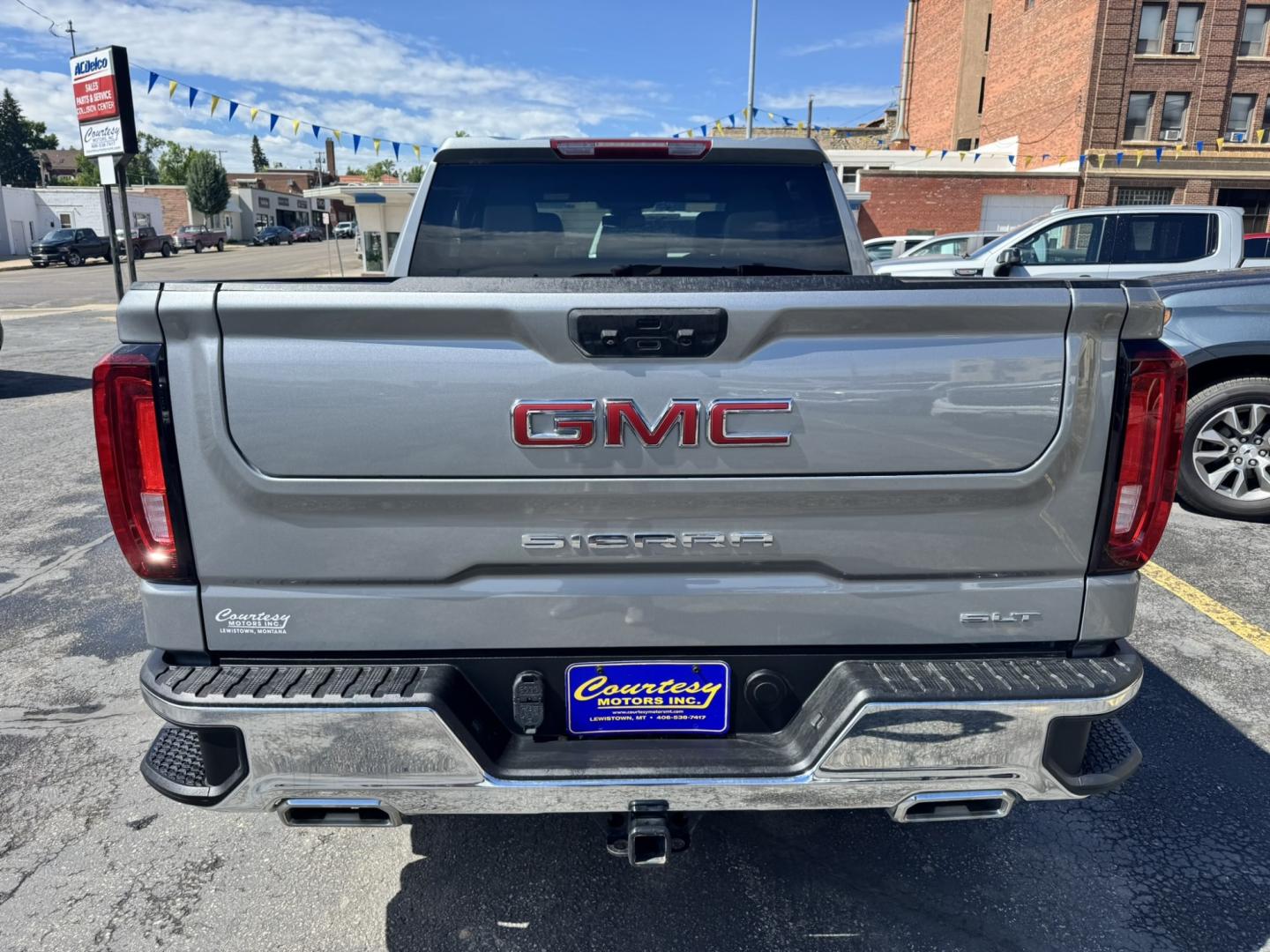 2023 Grey /Tan GMC Sierra 1500 SLT Crew Cab 4WD (1GTUUDEL4PZ) with an 6.2L V8 OHV 16V engine, 6A transmission, located at 116 5th Avenue South, Lewistown, MT, 59457, 47.063877, -109.427879 - Power, luxury, and capability come together in this 2023 GMC Sierra 1500 SLT Crew Cab 4WD. Under the hood is the legendary 6.2L V8, delivering an impressive 420 horsepower and paired with a smooth 10-speed automatic transmission for confident towing, hauling, and everyday driving. The spacious Crew- Photo#3