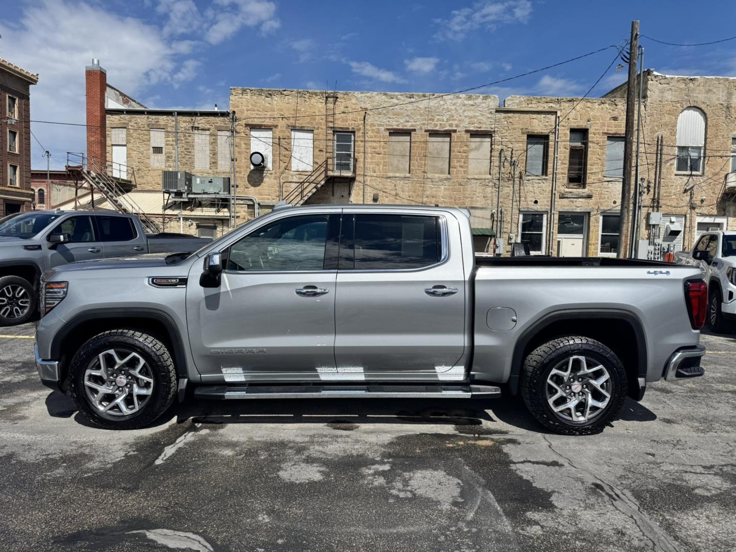 2023 Grey /Tan GMC Sierra 1500 SLT Crew Cab 4WD (1GTUUDEL4PZ) with an 6.2L V8 OHV 16V engine, 6A transmission, located at 116 5th Avenue South, Lewistown, MT, 59457, 47.063877, -109.427879 - Power, luxury, and capability come together in this 2023 GMC Sierra 1500 SLT Crew Cab 4WD. Under the hood is the legendary 6.2L V8, delivering an impressive 420 horsepower and paired with a smooth 10-speed automatic transmission for confident towing, hauling, and everyday driving. The spacious Crew- Photo#5