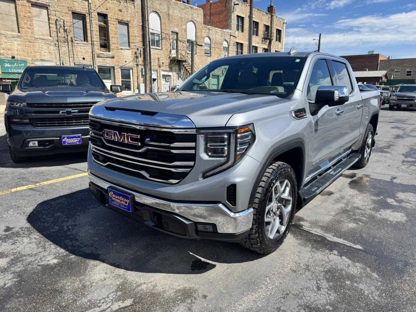 2023 Grey /Tan GMC Sierra 1500 SLT Crew Cab 4WD (1GTUUDEL4PZ) with an 6.2L V8 OHV 16V engine, 6A transmission, located at 116 5th Avenue South, Lewistown, MT, 59457, 47.063877, -109.427879 - Power, luxury, and capability come together in this 2023 GMC Sierra 1500 SLT Crew Cab 4WD. Under the hood is the legendary 6.2L V8, delivering an impressive 420 horsepower and paired with a smooth 10-speed automatic transmission for confident towing, hauling, and everyday driving. The spacious Crew- Photo#6