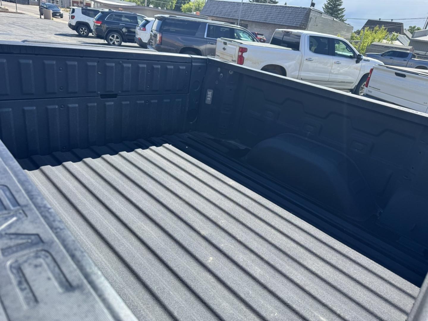 2023 Grey /Tan GMC Sierra 1500 SLT Crew Cab 4WD (1GTUUDEL4PZ) with an 6.2L V8 OHV 16V engine, 6A transmission, located at 116 5th Avenue South, Lewistown, MT, 59457, 47.063877, -109.427879 - Power, luxury, and capability come together in this 2023 GMC Sierra 1500 SLT Crew Cab 4WD. Under the hood is the legendary 6.2L V8, delivering an impressive 420 horsepower and paired with a smooth 10-speed automatic transmission for confident towing, hauling, and everyday driving. The spacious Crew- Photo#9