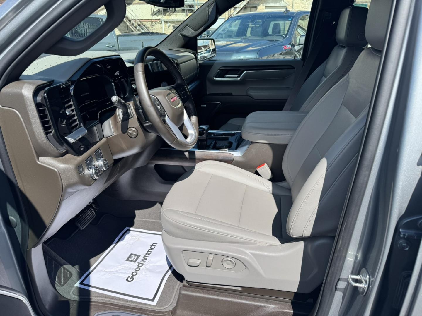 2023 Grey /Tan GMC Sierra 1500 SLT Crew Cab 4WD (1GTUUDEL4PZ) with an 6.2L V8 OHV 16V engine, 6A transmission, located at 116 5th Avenue South, Lewistown, MT, 59457, 47.063877, -109.427879 - Power, luxury, and capability come together in this 2023 GMC Sierra 1500 SLT Crew Cab 4WD. Under the hood is the legendary 6.2L V8, delivering an impressive 420 horsepower and paired with a smooth 10-speed automatic transmission for confident towing, hauling, and everyday driving. The spacious Crew- Photo#11