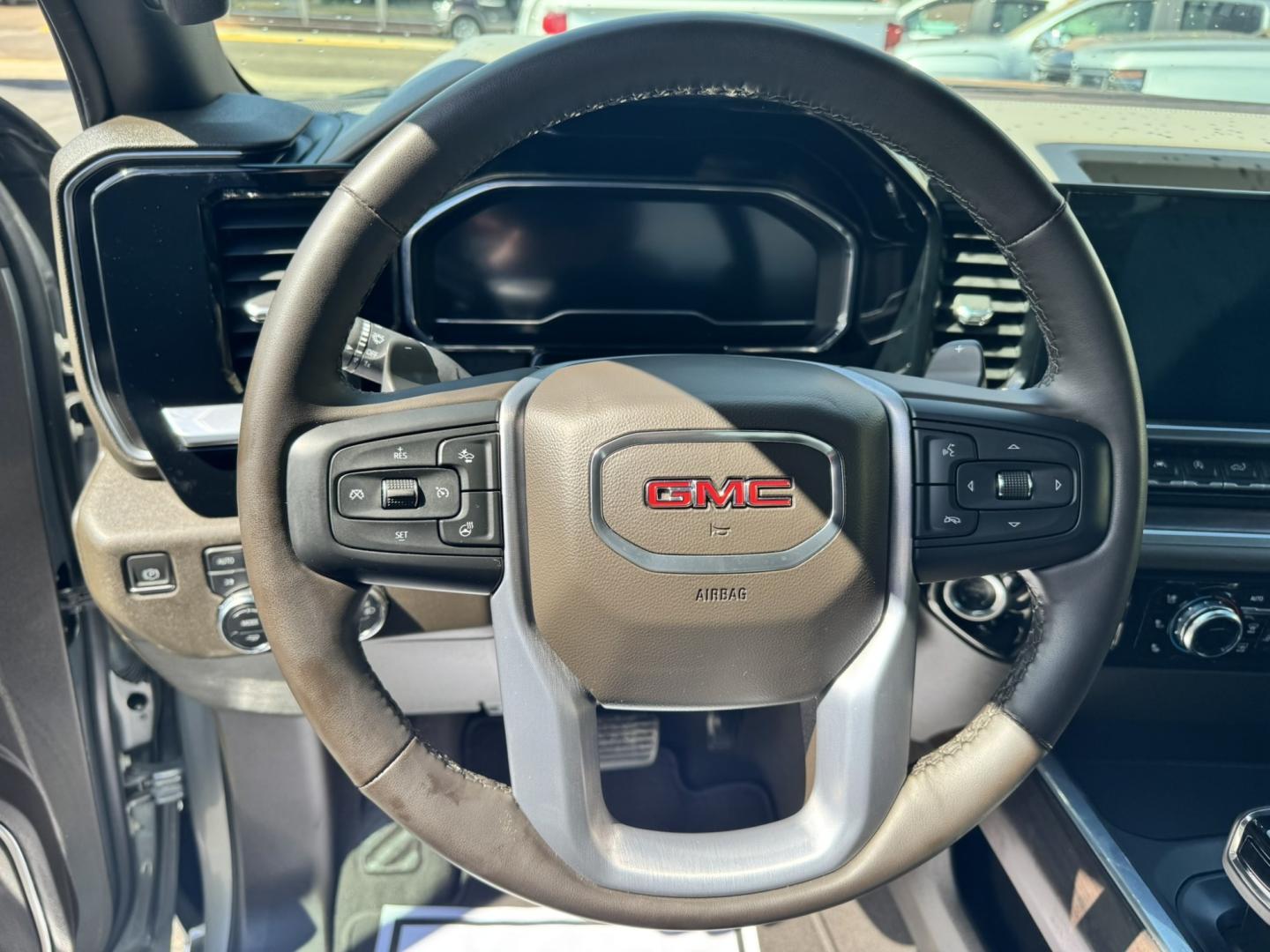 2023 Grey /Tan GMC Sierra 1500 SLT Crew Cab 4WD (1GTUUDEL4PZ) with an 6.2L V8 OHV 16V engine, 6A transmission, located at 116 5th Avenue South, Lewistown, MT, 59457, 47.063877, -109.427879 - Power, luxury, and capability come together in this 2023 GMC Sierra 1500 SLT Crew Cab 4WD. Under the hood is the legendary 6.2L V8, delivering an impressive 420 horsepower and paired with a smooth 10-speed automatic transmission for confident towing, hauling, and everyday driving. The spacious Crew- Photo#15