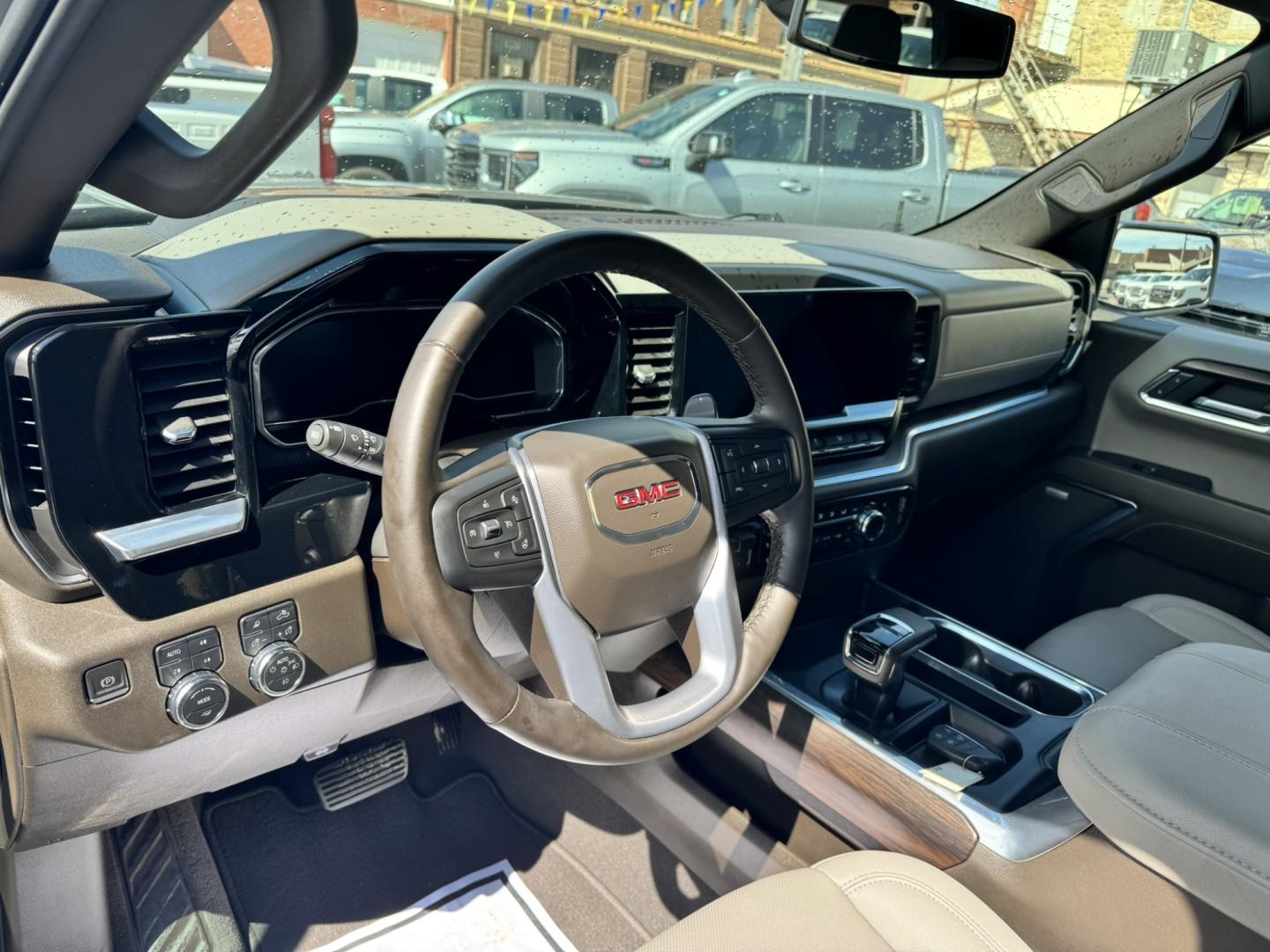 2023 Grey /Tan GMC Sierra 1500 SLT Crew Cab 4WD (1GTUUDEL4PZ) with an 6.2L V8 OHV 16V engine, 6A transmission, located at 116 5th Avenue South, Lewistown, MT, 59457, 47.063877, -109.427879 - Power, luxury, and capability come together in this 2023 GMC Sierra 1500 SLT Crew Cab 4WD. Under the hood is the legendary 6.2L V8, delivering an impressive 420 horsepower and paired with a smooth 10-speed automatic transmission for confident towing, hauling, and everyday driving. The spacious Crew- Photo#16