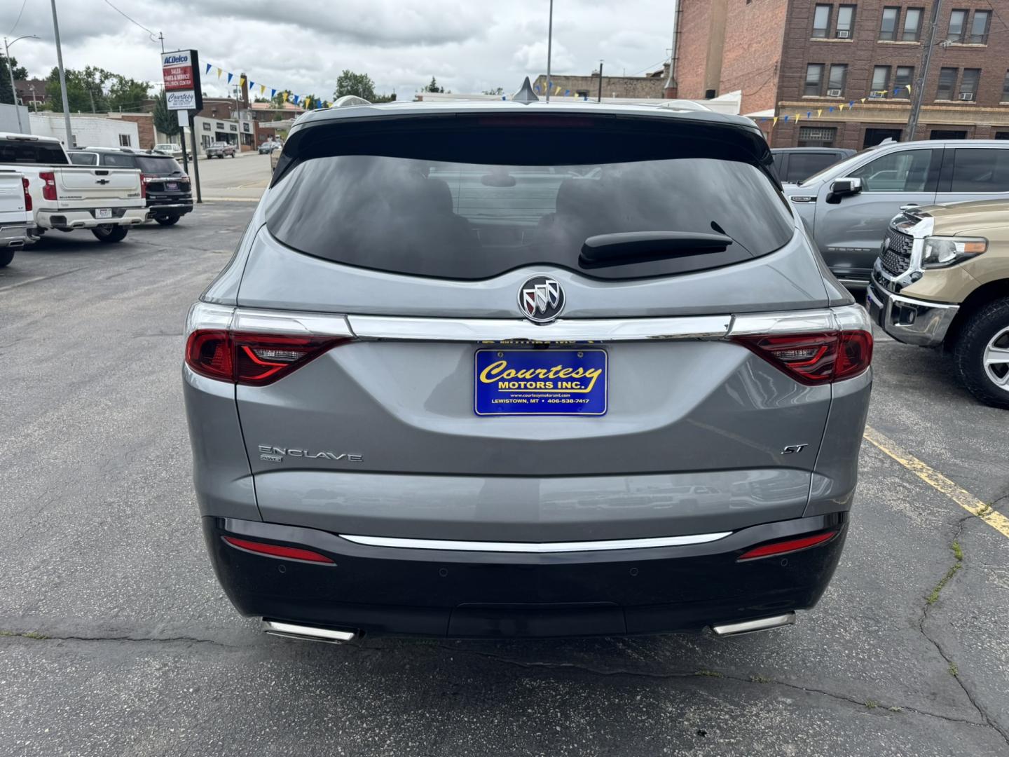 2023 Grey /Grey Buick Enclave Essence AWD (5GAEVAKW9PJ) with an 3.6L V6 DOHC 24V engine, 9A transmission, located at 116 5th Avenue South, Lewistown, MT, 59457, 47.063877, -109.427879 - Experience premium comfort, modern technology, and confidence in every season with this 2023 Buick Enclave Essence AWD. As a GM Lease Return, this Enclave has been well cared for and offers exceptional value on a like-new SUV. Designed with families in mind, the Enclave features three rows of spaci- Photo#3