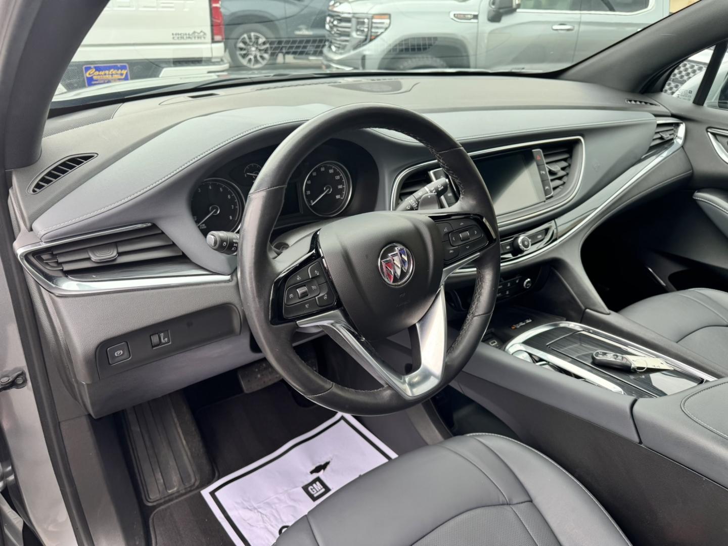 2023 Grey /Grey Buick Enclave Essence AWD (5GAEVAKW9PJ) with an 3.6L V6 DOHC 24V engine, 9A transmission, located at 116 5th Avenue South, Lewistown, MT, 59457, 47.063877, -109.427879 - Experience premium comfort, modern technology, and confidence in every season with this 2023 Buick Enclave Essence AWD. As a GM Lease Return, this Enclave has been well cared for and offers exceptional value on a like-new SUV. Designed with families in mind, the Enclave features three rows of spaci- Photo#14