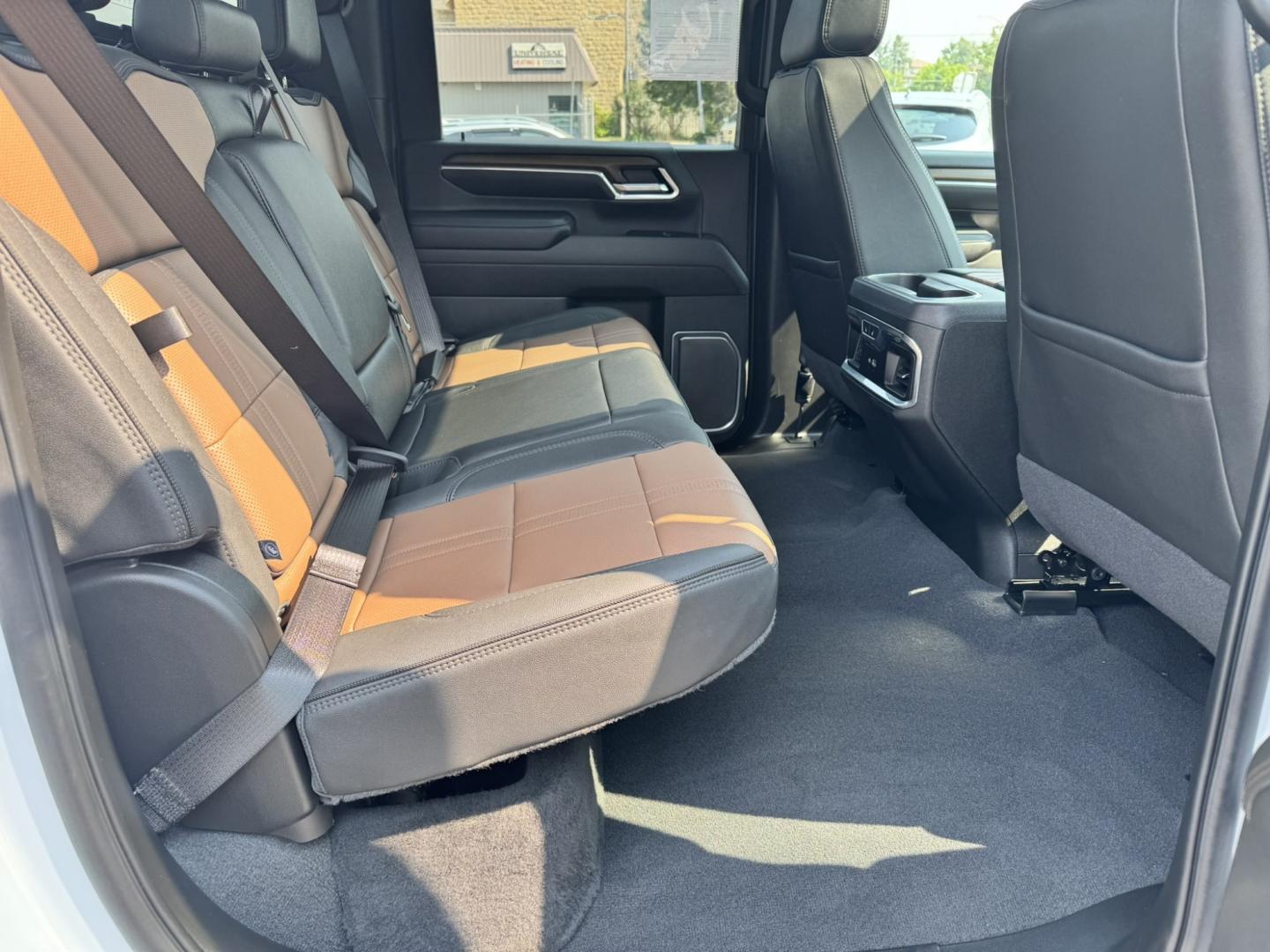 2025 WHITE /Tan Chevrolet Silverado 3500HD High Country Crew Cab 4WD (1GC4KVEY3SF) with an 6.6L V8 OHV 32V TURBO DIESEL engine, 6A transmission, located at 116 5th Avenue South, Lewistown, MT, 59457, 47.063877, -109.427879 - When only the best will do, this 2025 Chevrolet Silverado 3500HD High Country Crew Cab 4WD with the Duramax Turbo-Diesel delivers. Built for serious towing, hauling, and long days on the road, this heavy-duty pickup combines premium luxury with incredible capability, making it equally at home on the- Photo#9