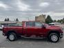 2023 Maroon /Tan GMC Sierra 2500HD SLT Crew Cab 2WD (1GT49NEY6PF) with an 6.6L V8 OHV 16V TURBO DIESEL engine, 6A transmission, located at 116 5th Avenue South, Lewistown, MT, 59457, 47.063877, -109.427879 - When it's time to get serious about towing, hauling, or simply driving one of the nicest heavy-duty trucks on the road, this 2023 GMC Sierra 2500HD SLT Crew Cab 4x4 is ready for the job. Powered by the legendary 6.6L Duramax Turbo-Diesel V8 paired with the Allison® 10-speed automatic transmission,- Photo#1