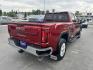 2023 Maroon /Tan GMC Sierra 2500HD SLT Crew Cab 2WD (1GT49NEY6PF) with an 6.6L V8 OHV 16V TURBO DIESEL engine, 6A transmission, located at 116 5th Avenue South, Lewistown, MT, 59457, 47.063877, -109.427879 - When it's time to get serious about towing, hauling, or simply driving one of the nicest heavy-duty trucks on the road, this 2023 GMC Sierra 2500HD SLT Crew Cab 4x4 is ready for the job. Powered by the legendary 6.6L Duramax Turbo-Diesel V8 paired with the Allison® 10-speed automatic transmission,- Photo#2