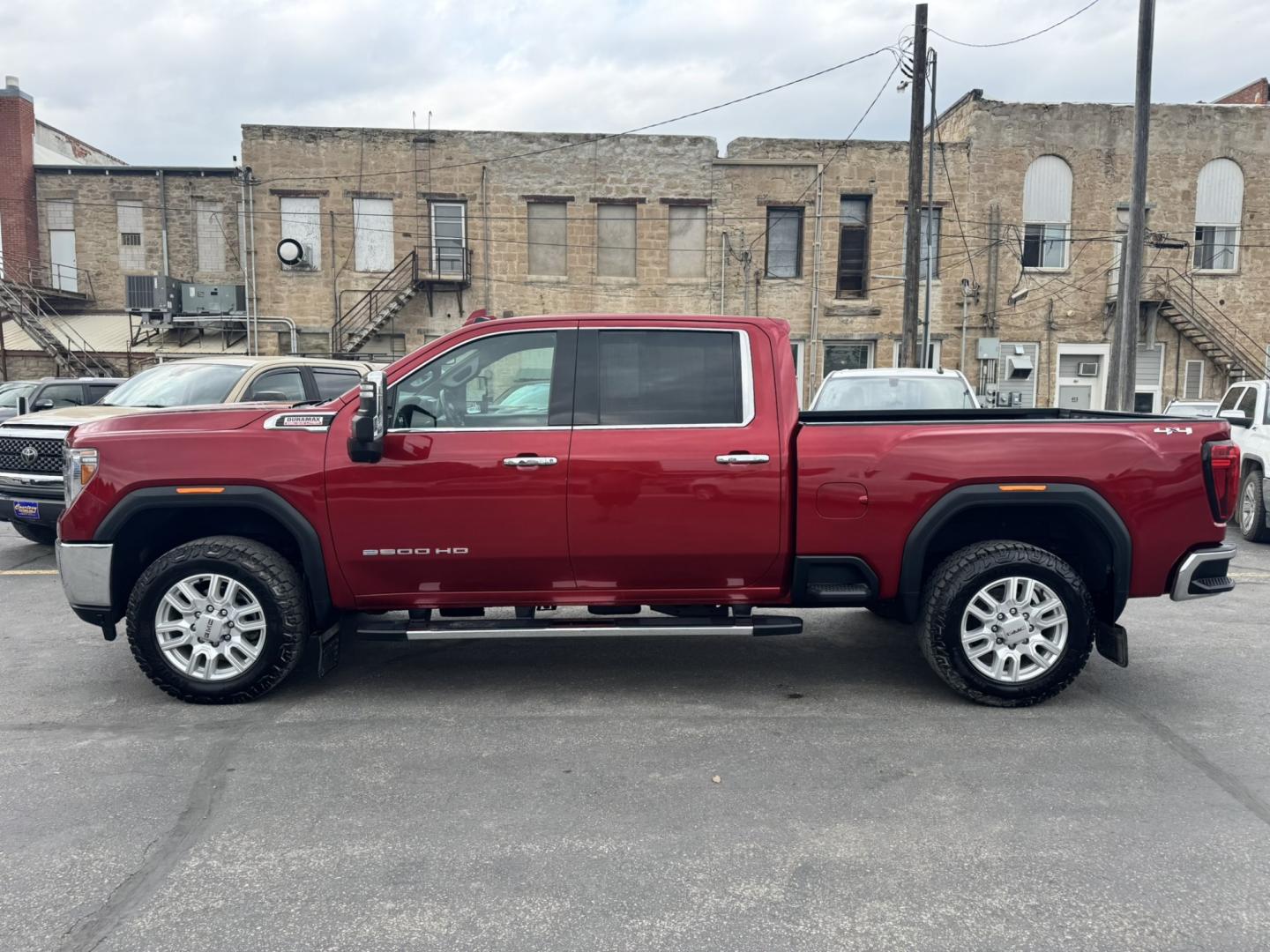 2023 Maroon /Tan GMC Sierra 2500HD SLT Crew Cab 2WD (1GT49NEY6PF) with an 6.6L V8 OHV 16V TURBO DIESEL engine, 6A transmission, located at 116 5th Avenue South, Lewistown, MT, 59457, 47.063877, -109.427879 - When it's time to get serious about towing, hauling, or simply driving one of the nicest heavy-duty trucks on the road, this 2023 GMC Sierra 2500HD SLT Crew Cab 4x4 is ready for the job. Powered by the legendary 6.6L Duramax Turbo-Diesel V8 paired with the Allison® 10-speed automatic transmission,- Photo#6