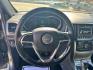 2018 Grey /Grey Jeep Grand Cherokee Laredo 4WD (1C4RJFAG8JC) with an 3.6L V6 DOHC 24V engine, 8A transmission, located at 116 5th Avenue South, Lewistown, MT, 59457, 47.063877, -109.427879 - Clean Car Fax on this local trade!- Photo#12