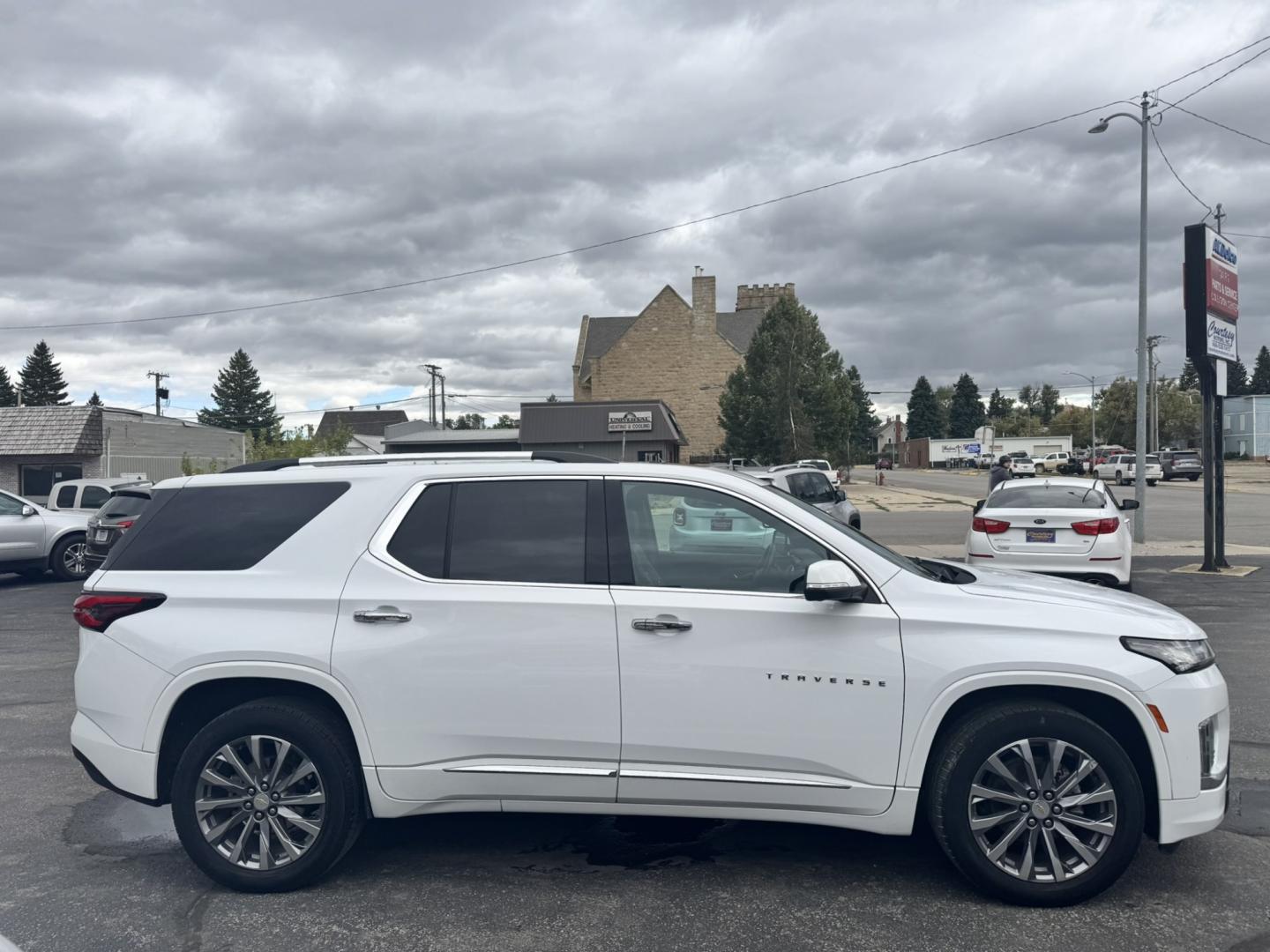 2023 WHITE /Black Chevrolet Traverse Premier AWD (1GNEVKKW9PJ) with an 3.6L V6 DOHC 24V engine, 9A transmission, located at 116 5th Avenue South, Lewistown, MT, 59457, 47.063877, -109.427879 - This 2023 Chevrolet Traverse Premier AWD gives you the perfect combination of luxury, space and all-weather capability. Powered by the proven 3.6L V6 with 310 horsepower and paired with a 9-speed automatic transmission, the Traverse has plenty of power while the AWD system gives you added confidence- Photo#1