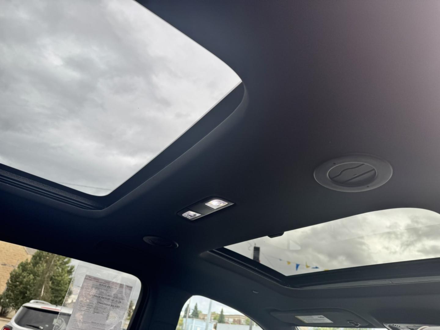 2023 WHITE /Black Chevrolet Traverse Premier AWD (1GNEVKKW9PJ) with an 3.6L V6 DOHC 24V engine, 9A transmission, located at 116 5th Avenue South, Lewistown, MT, 59457, 47.063877, -109.427879 - This 2023 Chevrolet Traverse Premier AWD gives you the perfect combination of luxury, space and all-weather capability. Powered by the proven 3.6L V6 with 310 horsepower and paired with a 9-speed automatic transmission, the Traverse has plenty of power while the AWD system gives you added confidence- Photo#9