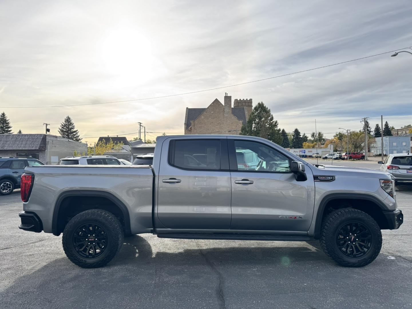 2023 Grey /Black GMC Sierra 1500 AT4X Crew Cab 4WD (3GTUUFEL6PG) with an 6.2L V8 OHV 16V engine, 6A transmission, located at 116 5th Avenue South, Lewistown, MT, 59457, 47.063877, -109.427879 - 2023 GMC Sierra 1500 AT4X Crew Cab 4WD with the 6.2L V8 — this is the Sierra for someone who wants serious capability without giving up luxury. The AT4X takes the already impressive Sierra and adds the hardware and features to make it a legitimate off-road truck while still giving you an upscale,- Photo#1