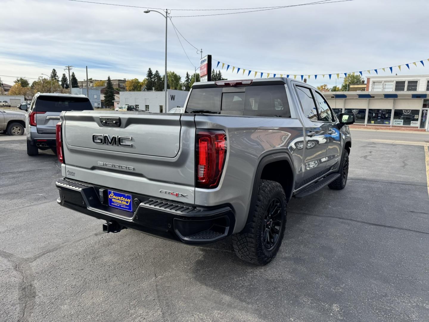 2023 Grey /Black GMC Sierra 1500 AT4X Crew Cab 4WD (3GTUUFEL6PG) with an 6.2L V8 OHV 16V engine, 6A transmission, located at 116 5th Avenue South, Lewistown, MT, 59457, 47.063877, -109.427879 - 2023 GMC Sierra 1500 AT4X Crew Cab 4WD with the 6.2L V8 — this is the Sierra for someone who wants serious capability without giving up luxury. The AT4X takes the already impressive Sierra and adds the hardware and features to make it a legitimate off-road truck while still giving you an upscale,- Photo#2