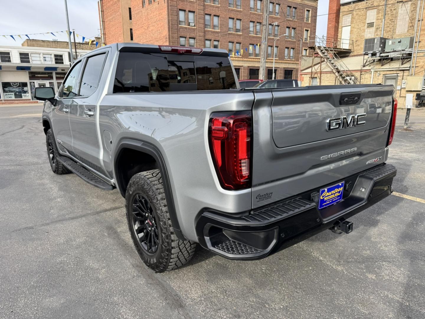 2023 Grey /Black GMC Sierra 1500 AT4X Crew Cab 4WD (3GTUUFEL6PG) with an 6.2L V8 OHV 16V engine, 6A transmission, located at 116 5th Avenue South, Lewistown, MT, 59457, 47.063877, -109.427879 - 2023 GMC Sierra 1500 AT4X Crew Cab 4WD with the 6.2L V8 — this is the Sierra for someone who wants serious capability without giving up luxury. The AT4X takes the already impressive Sierra and adds the hardware and features to make it a legitimate off-road truck while still giving you an upscale,- Photo#4