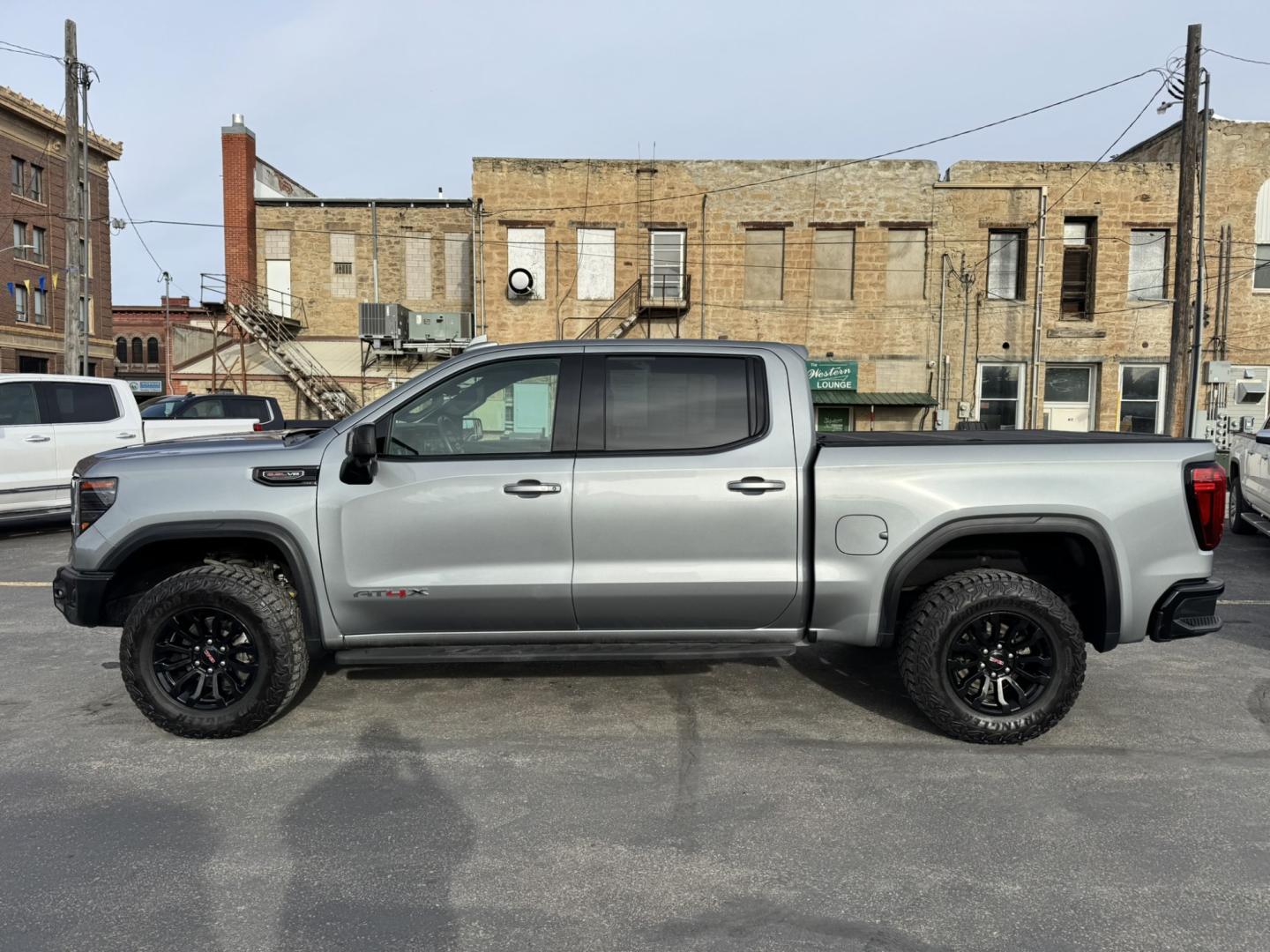 2023 Grey /Black GMC Sierra 1500 AT4X Crew Cab 4WD (3GTUUFEL6PG) with an 6.2L V8 OHV 16V engine, 6A transmission, located at 116 5th Avenue South, Lewistown, MT, 59457, 47.063877, -109.427879 - 2023 GMC Sierra 1500 AT4X Crew Cab 4WD with the 6.2L V8 — this is the Sierra for someone who wants serious capability without giving up luxury. The AT4X takes the already impressive Sierra and adds the hardware and features to make it a legitimate off-road truck while still giving you an upscale,- Photo#6
