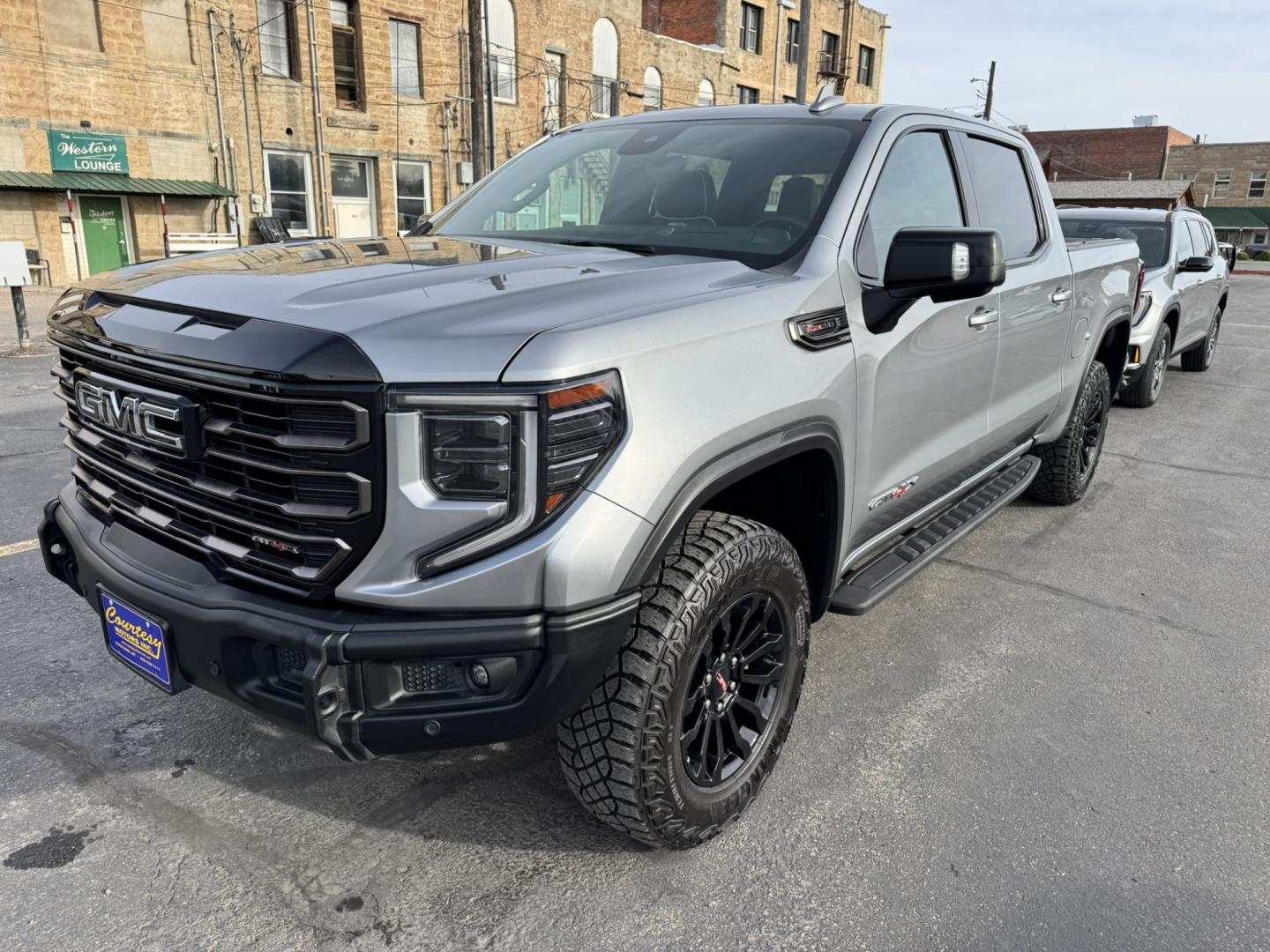 2023 Grey /Black GMC Sierra 1500 AT4X Crew Cab 4WD (3GTUUFEL6PG) with an 6.2L V8 OHV 16V engine, 6A transmission, located at 116 5th Avenue South, Lewistown, MT, 59457, 47.063877, -109.427879 - 2023 GMC Sierra 1500 AT4X Crew Cab 4WD with the 6.2L V8 — this is the Sierra for someone who wants serious capability without giving up luxury. The AT4X takes the already impressive Sierra and adds the hardware and features to make it a legitimate off-road truck while still giving you an upscale,- Photo#7
