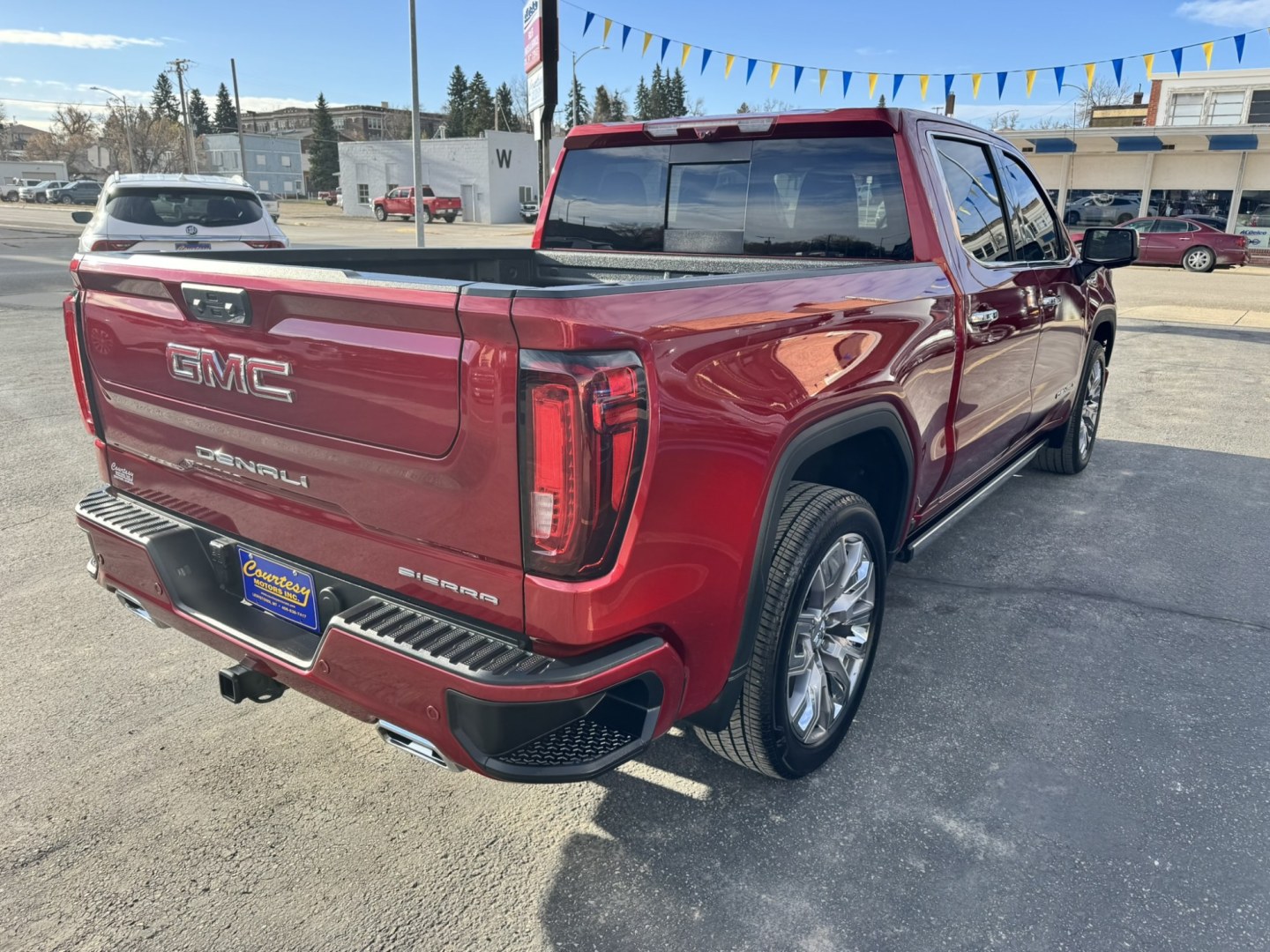 2024 Maroon /Black GMC Sierra 1500 Denali Crew Cab Short Box 4WD (3GTUUGEL8RG) with an 6.2L V8 OHV 16V engine, 6A transmission, located at 116 5th Avenue South, Lewistown, MT, 59457, 47.063877, -109.427879 - **2024 GMC Sierra 1500 Crew Cab Denali 4WD – 6.2L V8** Experience luxury and capability in this 2024 GMC Sierra 1500 Crew Cab Denali 4WD. The powerful 6.2L EcoTec3 V8 delivers **420 horsepower** and **460 lb-ft of torque**, paired with a 10-speed automatic and four-wheel drive for confident perfo- Photo#2