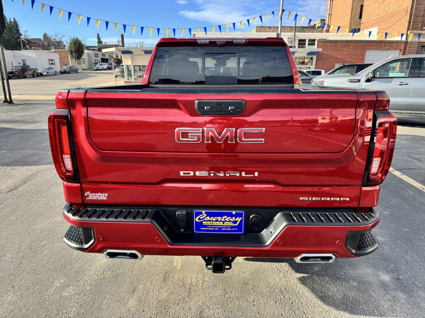 2024 Maroon /Black GMC Sierra 1500 Denali Crew Cab Short Box 4WD (3GTUUGEL8RG) with an 6.2L V8 OHV 16V engine, 6A transmission, located at 116 5th Avenue South, Lewistown, MT, 59457, 47.063877, -109.427879 - **2024 GMC Sierra 1500 Crew Cab Denali 4WD – 6.2L V8** Experience luxury and capability in this 2024 GMC Sierra 1500 Crew Cab Denali 4WD. The powerful 6.2L EcoTec3 V8 delivers **420 horsepower** and **460 lb-ft of torque**, paired with a 10-speed automatic and four-wheel drive for confident perfo- Photo#3