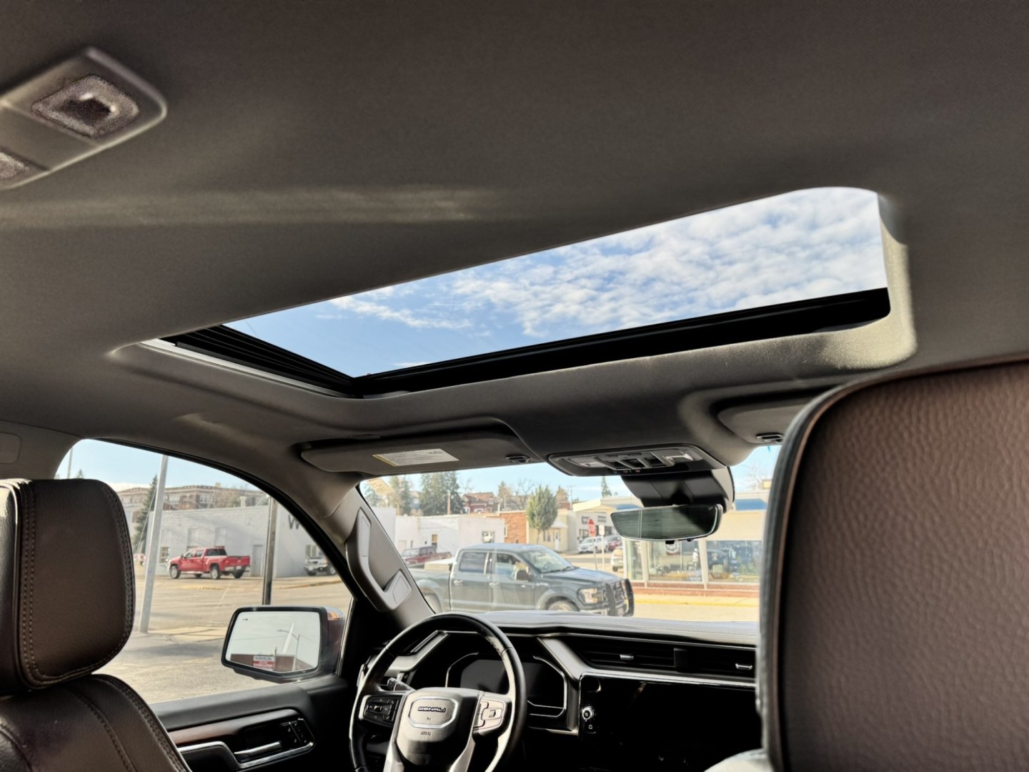 2024 Maroon /Black GMC Sierra 1500 Denali Crew Cab Short Box 4WD (3GTUUGEL8RG) with an 6.2L V8 OHV 16V engine, 6A transmission, located at 116 5th Avenue South, Lewistown, MT, 59457, 47.063877, -109.427879 - **2024 GMC Sierra 1500 Crew Cab Denali 4WD – 6.2L V8** Experience luxury and capability in this 2024 GMC Sierra 1500 Crew Cab Denali 4WD. The powerful 6.2L EcoTec3 V8 delivers **420 horsepower** and **460 lb-ft of torque**, paired with a 10-speed automatic and four-wheel drive for confident perfo- Photo#10