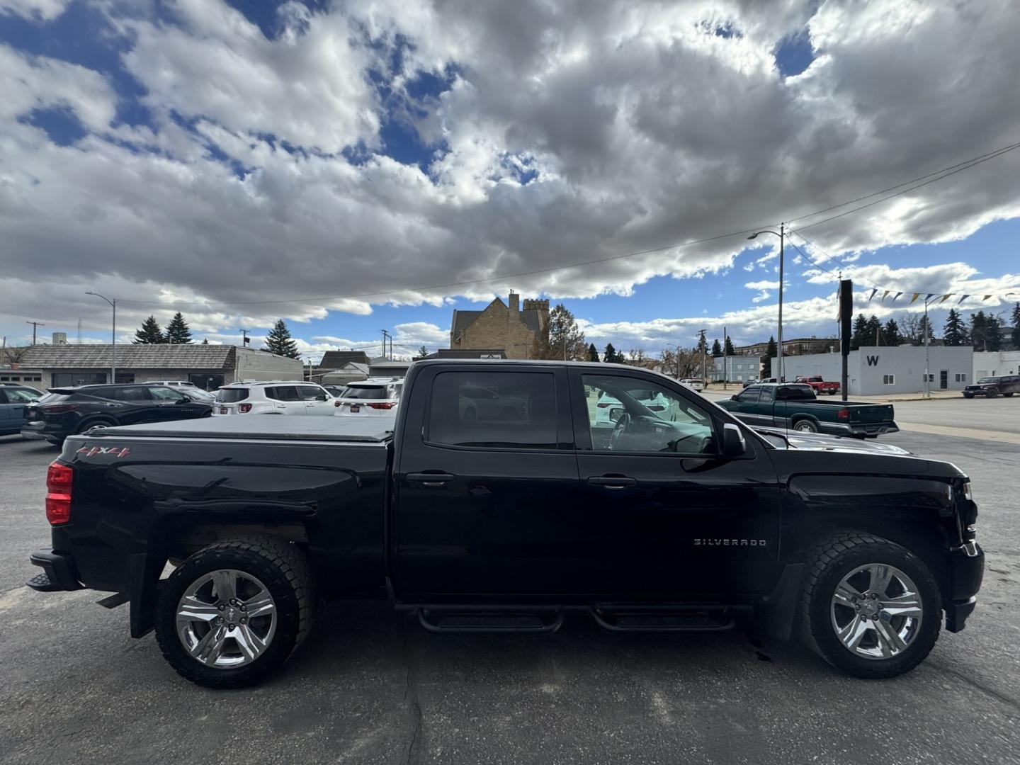 2018 Black /Grey Chevrolet Silverado 1500 Custom Crew Cab 4WD (3GCUKPEC1JG) with an 5.3L V8 OHV 16V engine, 6A transmission, located at 116 5th Avenue South, Lewistown, MT, 59457, 47.063877, -109.427879 - **2018 Chevrolet Silverado 1500 Crew Cab Custom 4WD** Ready for work and the weekend, this 2018 Chevrolet Silverado 1500 Crew Cab Custom 4WD delivers proven full-size truck capability. Powered by the available EcoTec3 5.3L V8 producing **355 horsepower** and **383 lb-ft of torque** (or the standa- Photo#1