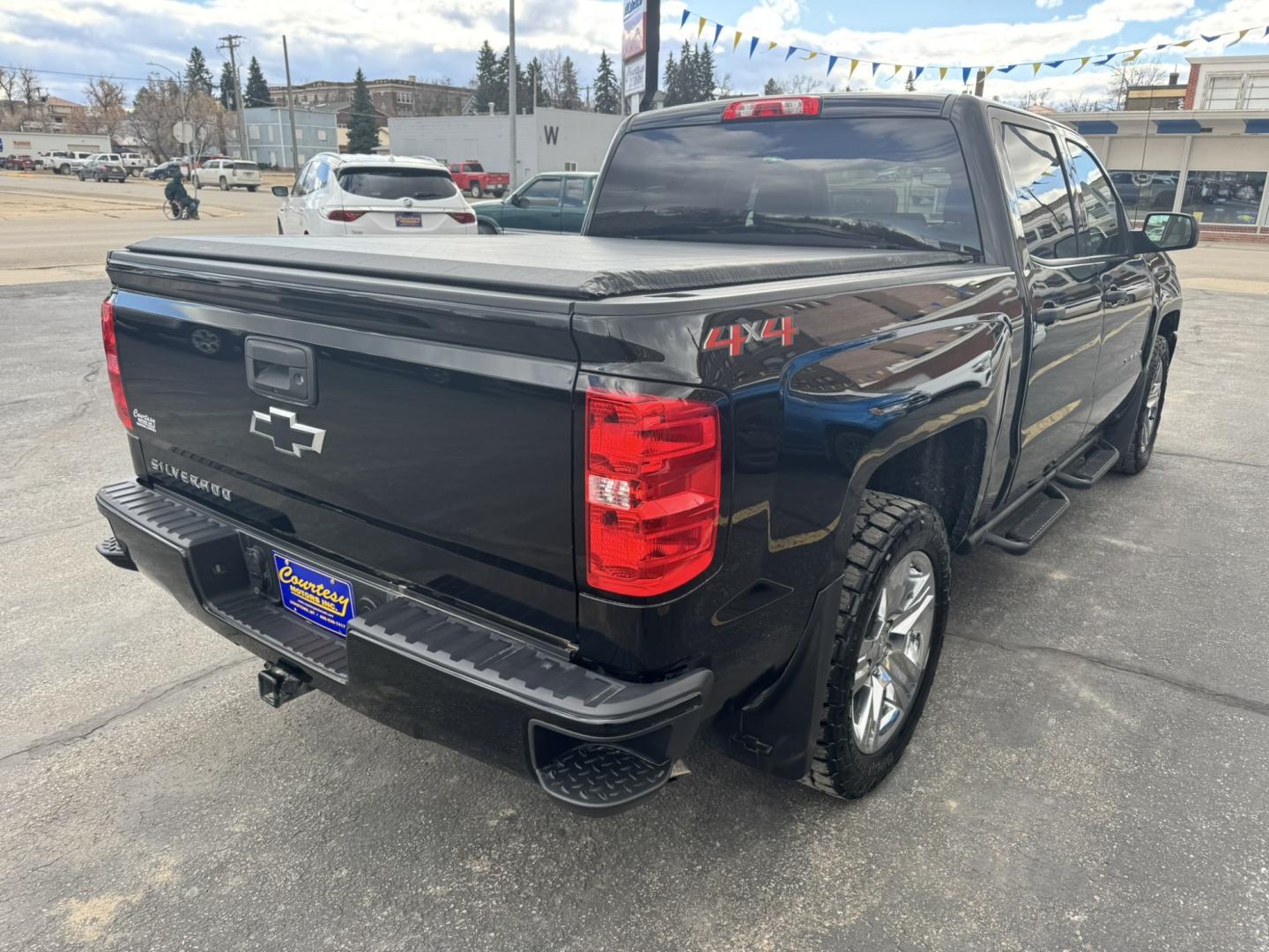 2018 Black /Grey Chevrolet Silverado 1500 Custom Crew Cab 4WD (3GCUKPEC1JG) with an 5.3L V8 OHV 16V engine, 6A transmission, located at 116 5th Avenue South, Lewistown, MT, 59457, 47.063877, -109.427879 - **2018 Chevrolet Silverado 1500 Crew Cab Custom 4WD** Ready for work and the weekend, this 2018 Chevrolet Silverado 1500 Crew Cab Custom 4WD delivers proven full-size truck capability. Powered by the available EcoTec3 5.3L V8 producing **355 horsepower** and **383 lb-ft of torque** (or the standa- Photo#2