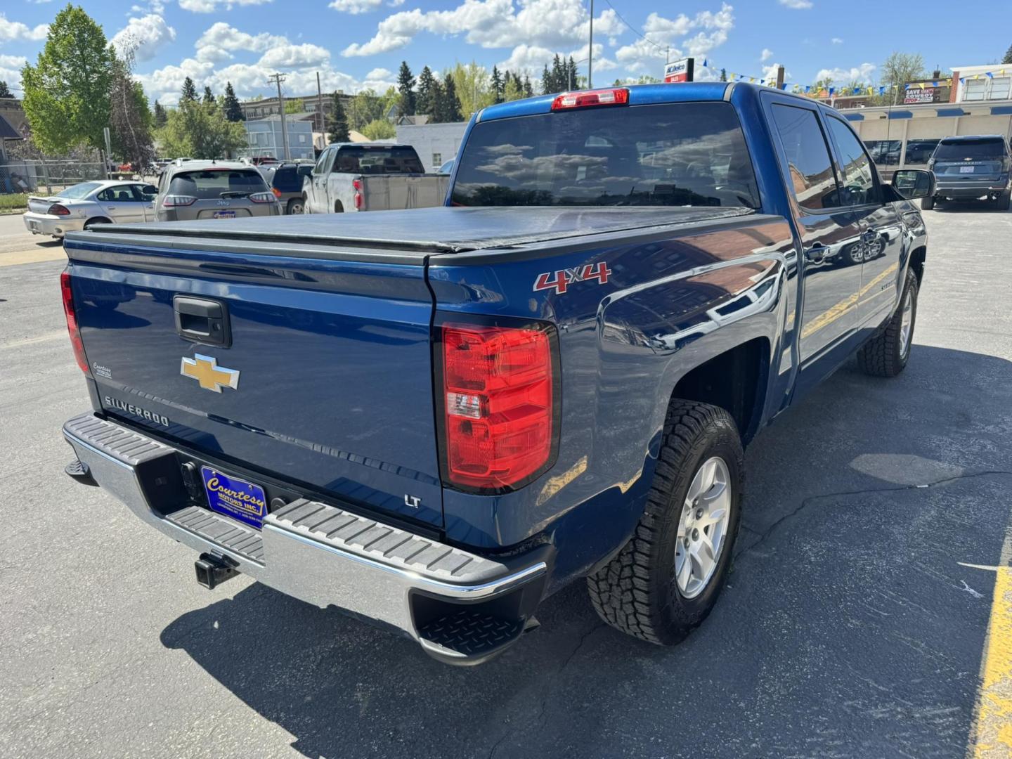 2016 BLUE /Grey Chevrolet Silverado 1500 LT Crew Cab 4WD (3GCUKRECXGG) with an 5.3L V8 OHV 16V engine, 6A transmission, located at 116 5th Avenue South, Lewistown, MT, 59457, 47.063877, -109.427879 - Clean Car Fax on this 2016 Chevrolet Silverado LT Crew Cab 4WD! Power driver seat, heated front seats, Navigation, Keyless Entry, remote start, tow package, heated exterior mirrors, ALL STAR EDITION * TRAILERING EQUIPMENT PKG INCL AUTO LOCKING REAR DIFFERENTIAL * PWR SEAT ADJUSTER, DRIVER * LED FRO - Photo#2