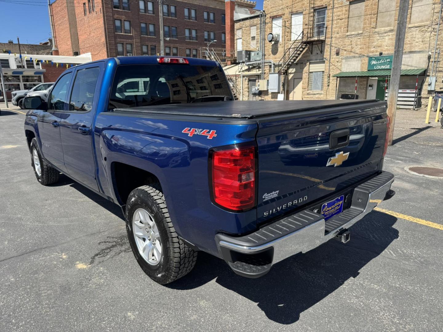 2016 BLUE /Grey Chevrolet Silverado 1500 LT Crew Cab 4WD (3GCUKRECXGG) with an 5.3L V8 OHV 16V engine, 6A transmission, located at 116 5th Avenue South, Lewistown, MT, 59457, 47.063877, -109.427879 - Clean Car Fax on this 2016 Chevrolet Silverado LT Crew Cab 4WD! Power driver seat, heated front seats, Navigation, Keyless Entry, remote start, tow package, heated exterior mirrors, ALL STAR EDITION * TRAILERING EQUIPMENT PKG INCL AUTO LOCKING REAR DIFFERENTIAL * PWR SEAT ADJUSTER, DRIVER * LED FRO - Photo#4