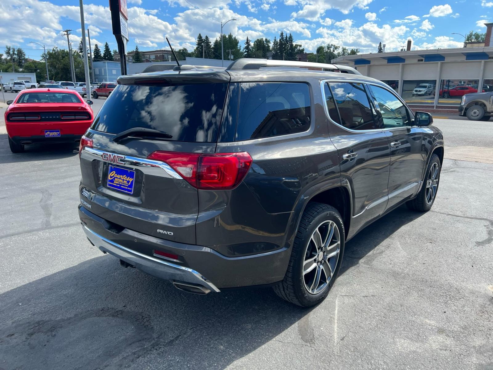 2019 Bronze Metallic /Tan GMC Acadia Denali AWD (1GKKNXLS9KZ) with an 3.6L V6 DOHC 24V engine, 6A transmission, located at 116 5th Avenue South, Lewistown, MT, 59457, 47.063877, -109.427879 - Clean Car Fax on this 2019 GMC Acadia Denali AWD! Loaded with navigation, heated and ventilated memory leather seats, rear heated seats, DRIVER ALERT PACKAGE II: * SAFETY ALERT SEAT * HEADLAMPS, INTELLIBEAM, AUTOMATIC HIGH-BEAM * FRONT & REAR PARK ASSIST * FOLLOWING DISTANCE INDICATOR * FORWARD COL - Photo #1