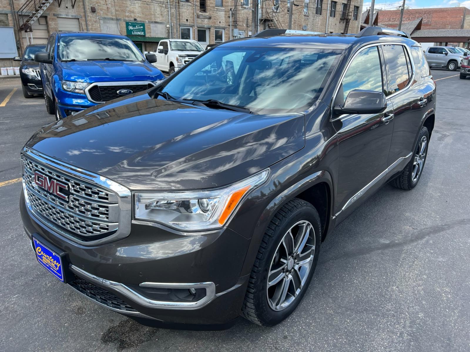 2019 Bronze Metallic /Tan GMC Acadia Denali AWD (1GKKNXLS9KZ) with an 3.6L V6 DOHC 24V engine, 6A transmission, located at 116 5th Avenue South, Lewistown, MT, 59457, 47.063877, -109.427879 - Clean Car Fax on this 2019 GMC Acadia Denali AWD! Loaded with navigation, heated and ventilated memory leather seats, rear heated seats, DRIVER ALERT PACKAGE II: * SAFETY ALERT SEAT * HEADLAMPS, INTELLIBEAM, AUTOMATIC HIGH-BEAM * FRONT & REAR PARK ASSIST * FOLLOWING DISTANCE INDICATOR * FORWARD COL - Photo #5