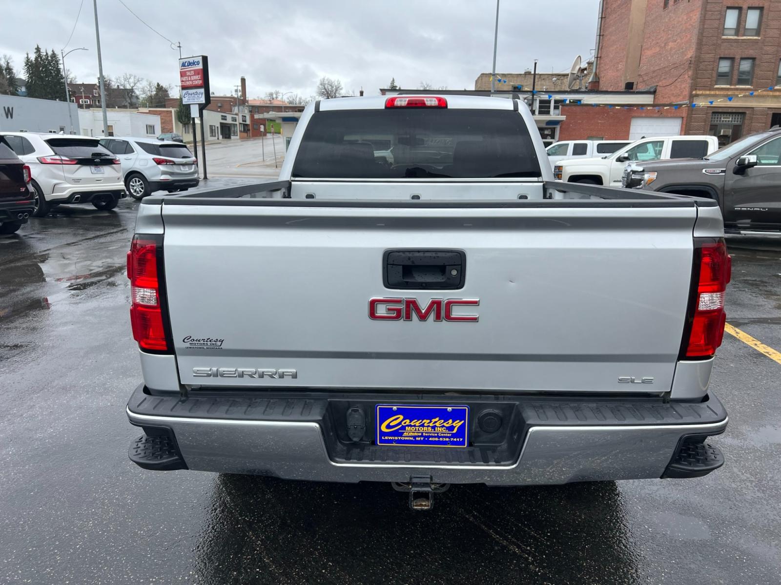 2017 SILVER /Ebony GMC Sierra 1500 SLE Crew Cab Standard Box 4WD (3GTU2MEC0HG) with an 5.3L V8 OHV 16V engine, 6A transmission, located at 116 5th Avenue South, Lewistown, MT, 59457, 47.063877, -109.427879 - Clean Car Fax on this 2017 GMC Sierra 1500 Crew Cab SLE! It's got the 6.5' box, trailer brake controller, locking differential, dual zone automatic climate control and more! The Sierra 1500 is a handsome machine, especially when decked out in the ultraluxurious Denali trim or the sinister-looking A - Photo #3